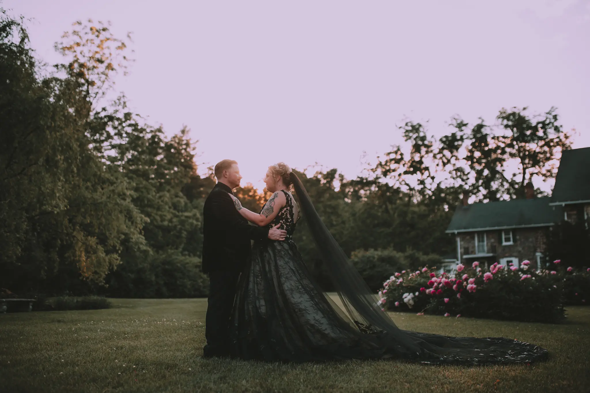 Groom With Bride Wearing Black Lace Ball Gown Zander By Sottero and Midgley