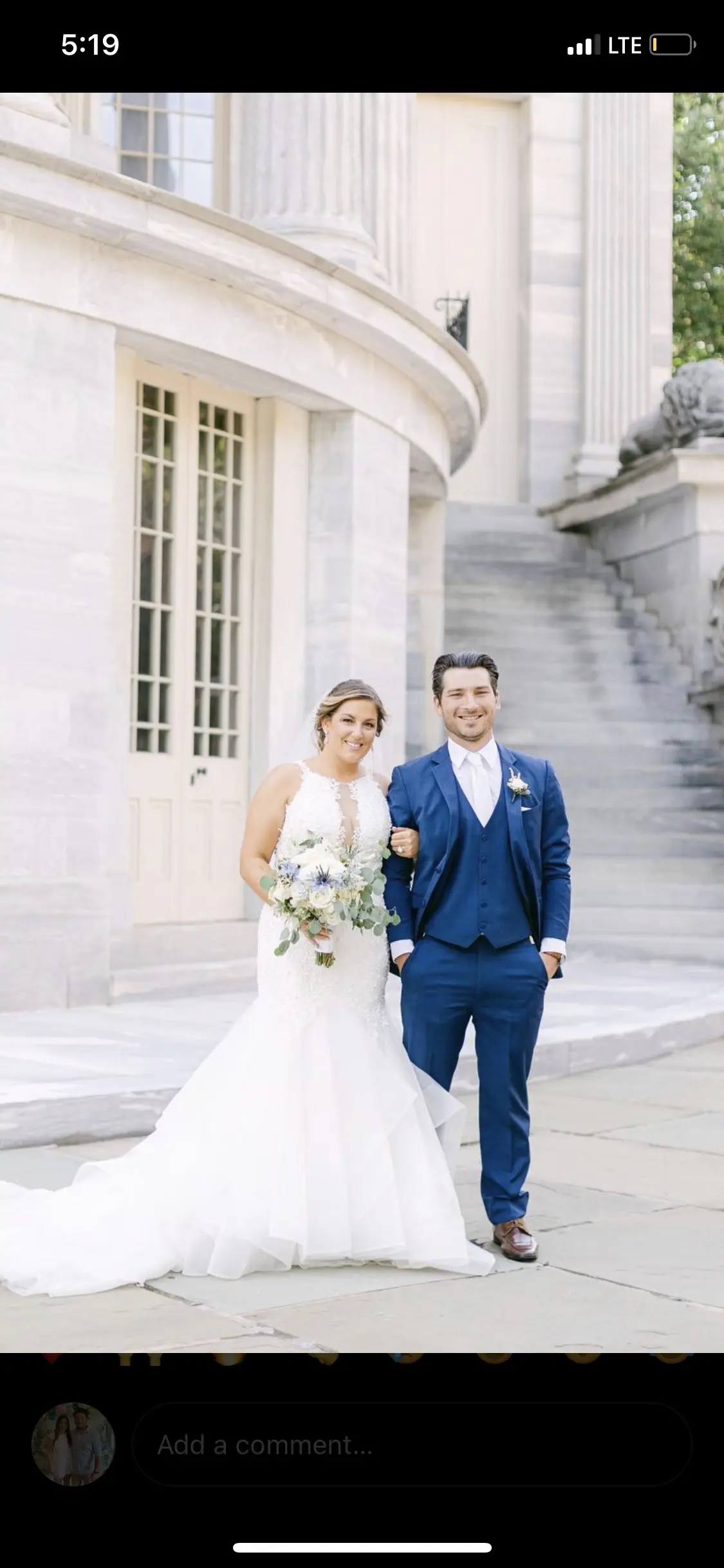 bride with groom wearing organza mermaid wedding dress