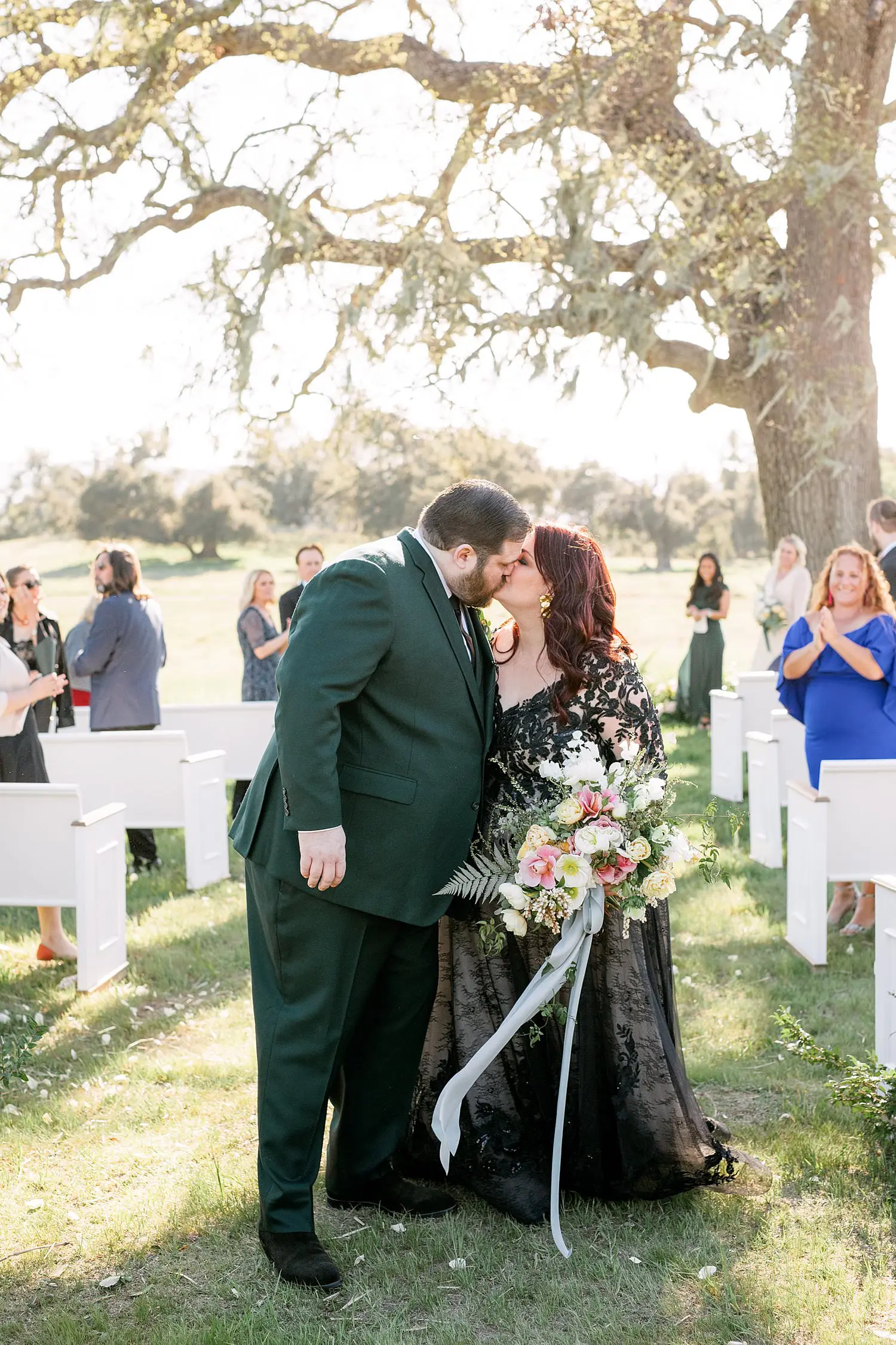 Bride and groom kissing after they have said I do.