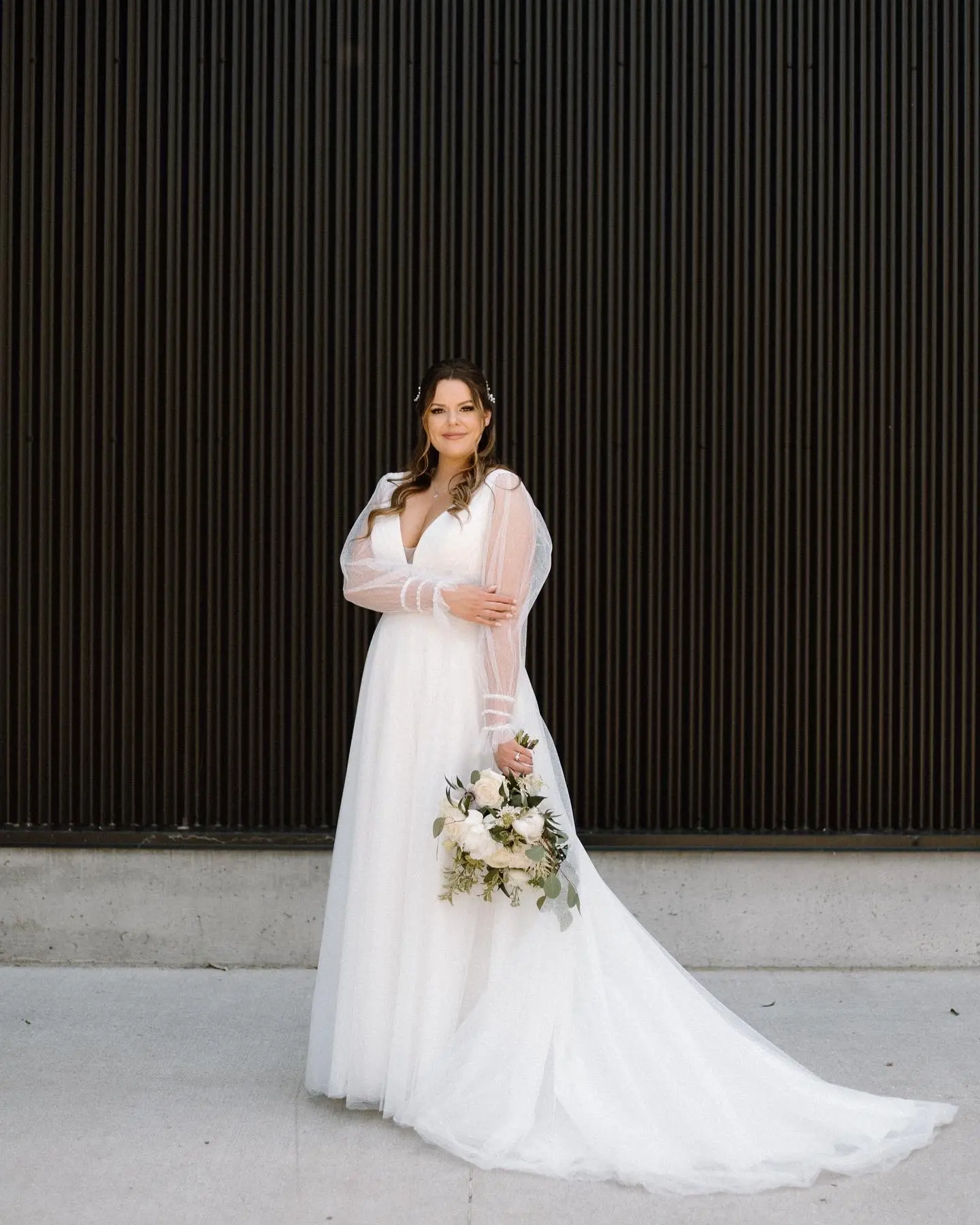 Bride In Bishop Sleeve Wedding Dress Called Joanne By Rebecca Ingram