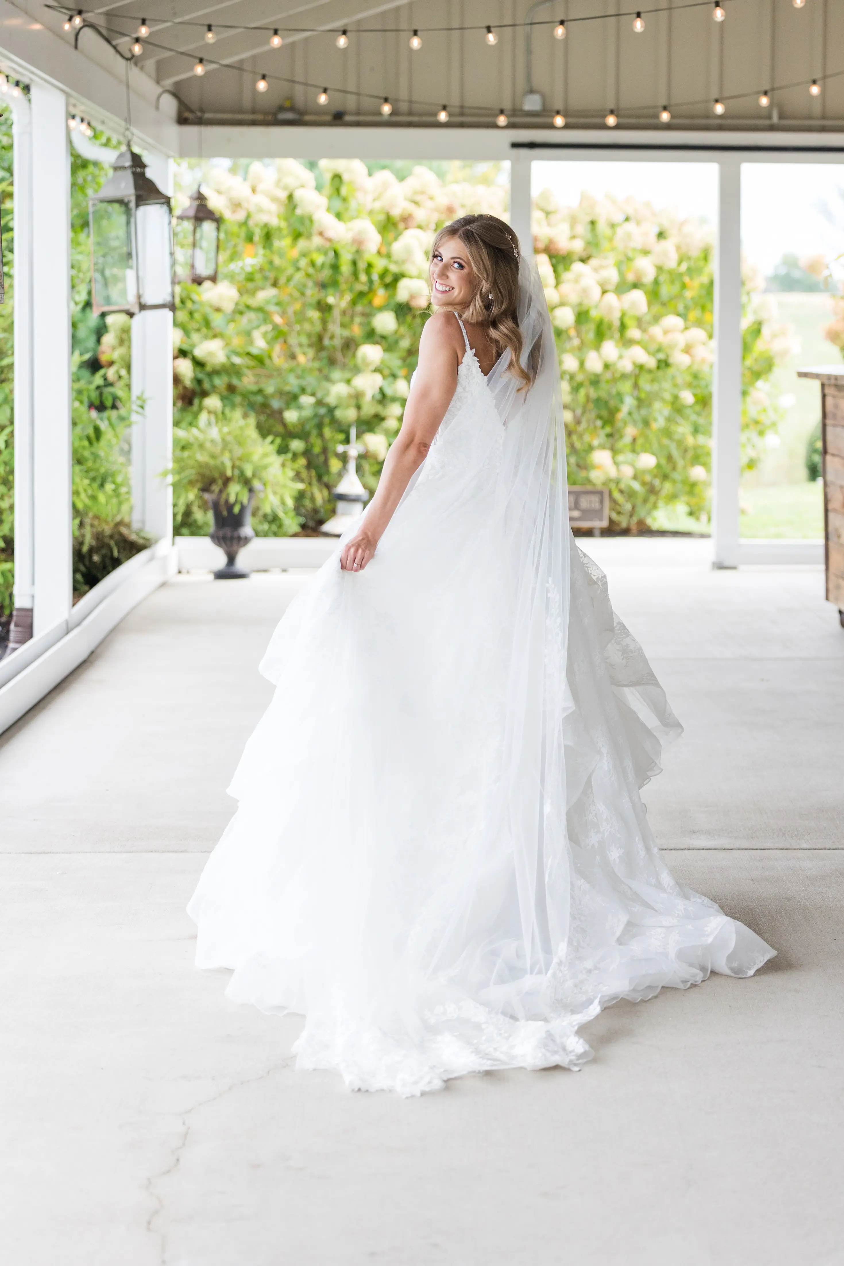 Real Bride in Modern Princess Wedding Dress with a Tiered Sequin Tulle Skirt Called Yuri by Maggie Sottero