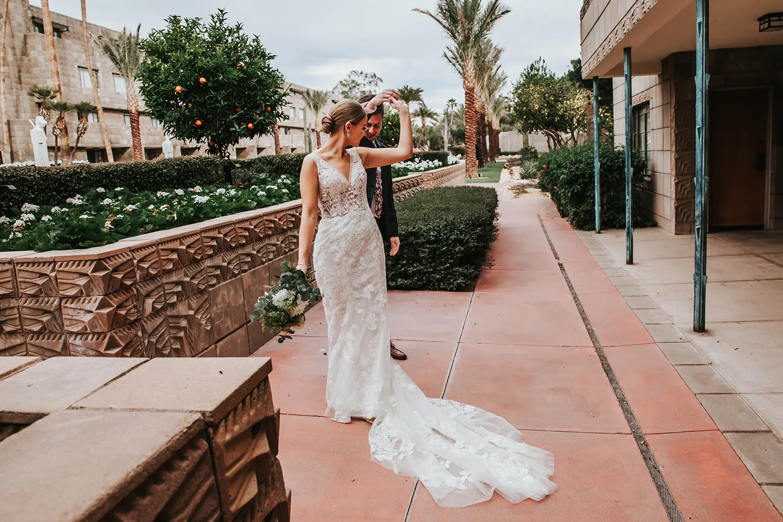 Bride With Bouquet in Floral A-Line Wedding Dress Called Greenley By Maggie Sottero