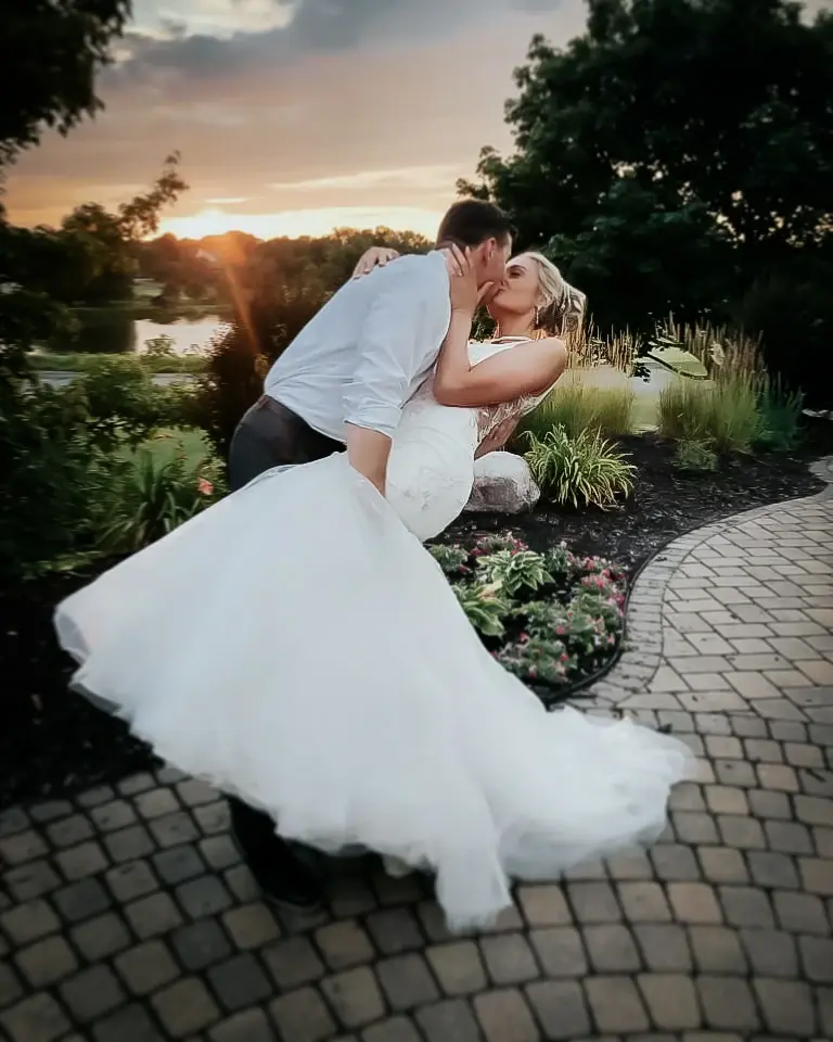 Groom With Bride Wearing Trumpet Wedding Dress With Colorful Floral Lace Motifs Kenleigh By Sottero And Midgley