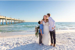 Bride wearing Johanna Lane wedding dress by Maggie Sottero with her family