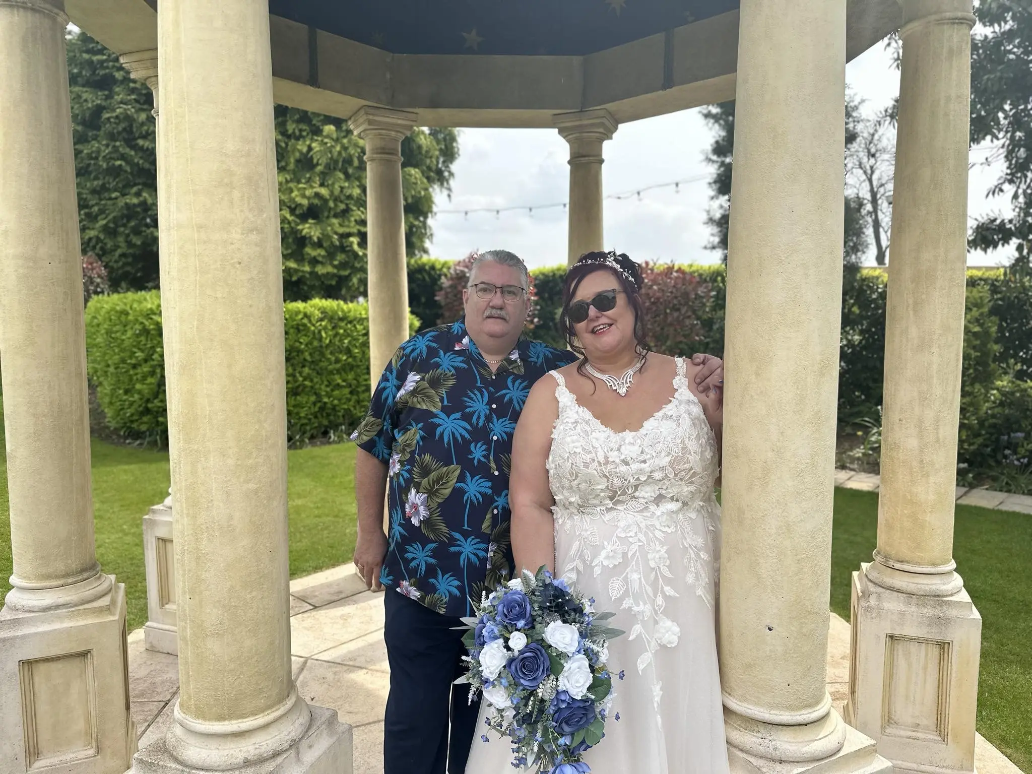 Bride wearing Natasha by Rebecca Ingram with her husband