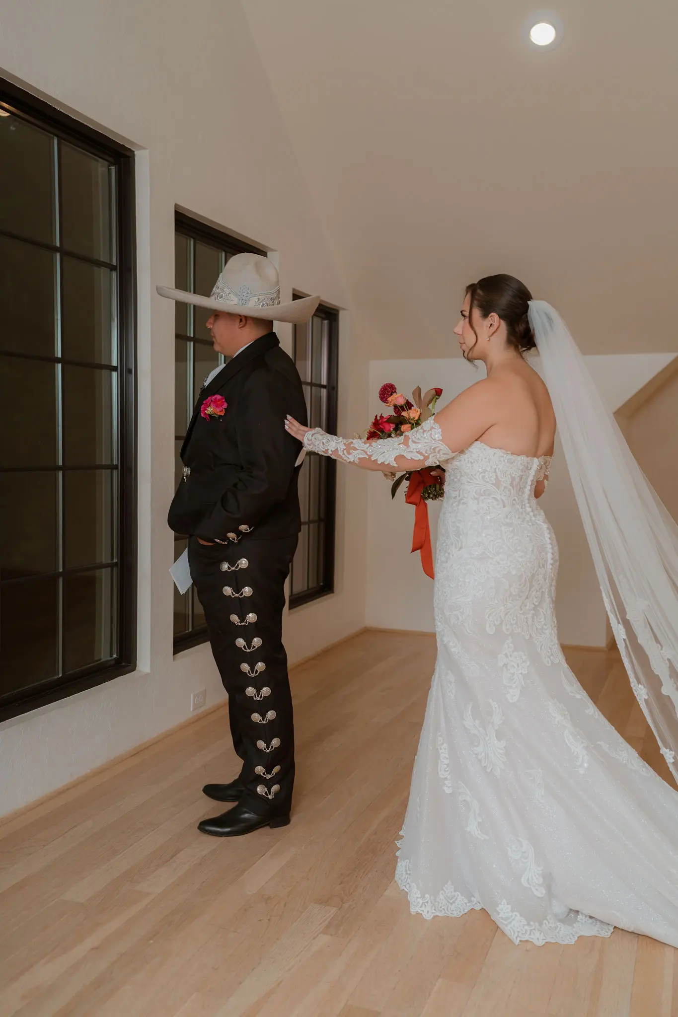 Bride wearing Fiona wedding dress by Maggie Sottero doing a first look