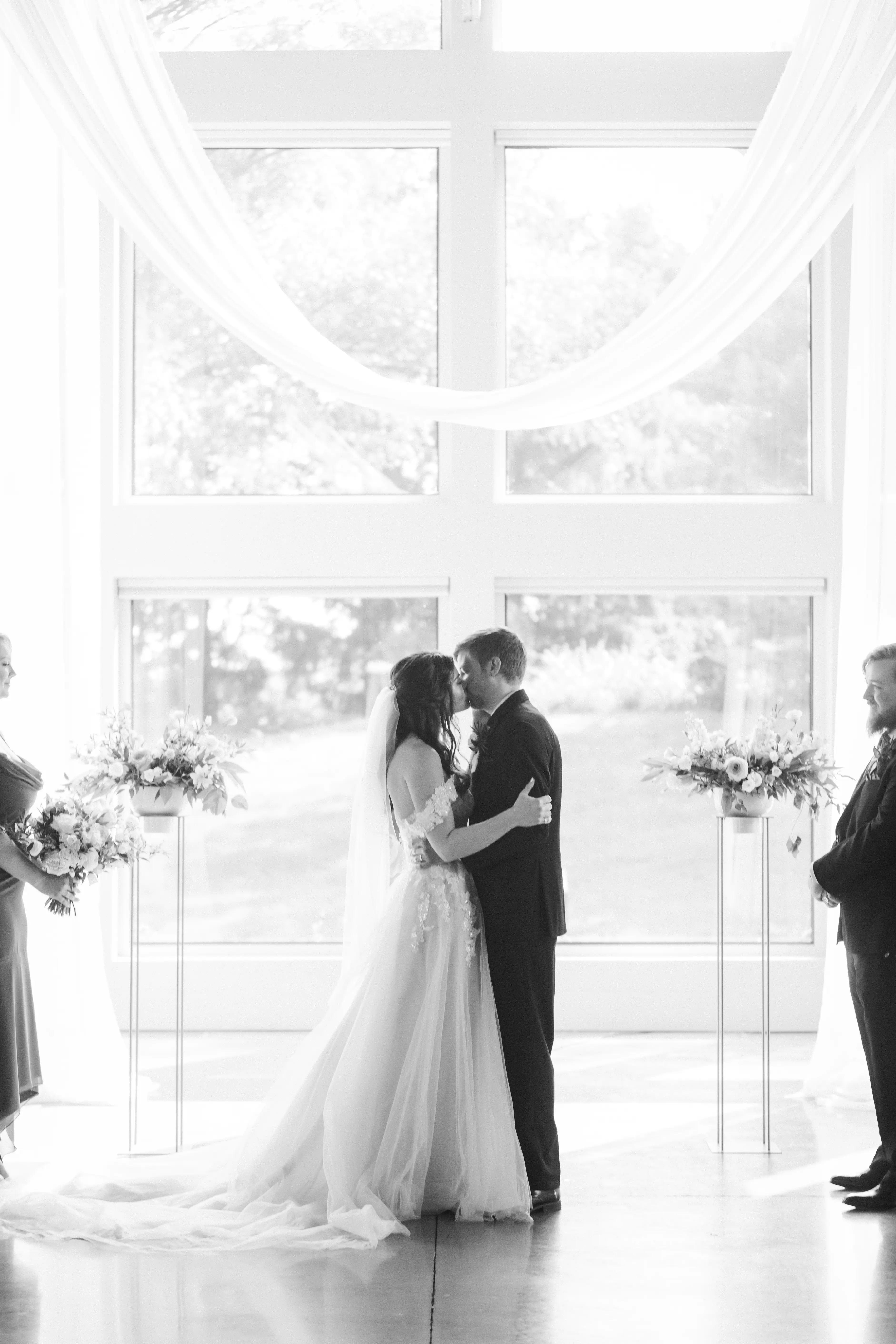 Groom With Bride Wearing A-Line Lace Wedding Dress With Customized Off The Shoulder Sleeves Stevie By Maggie Sottero
