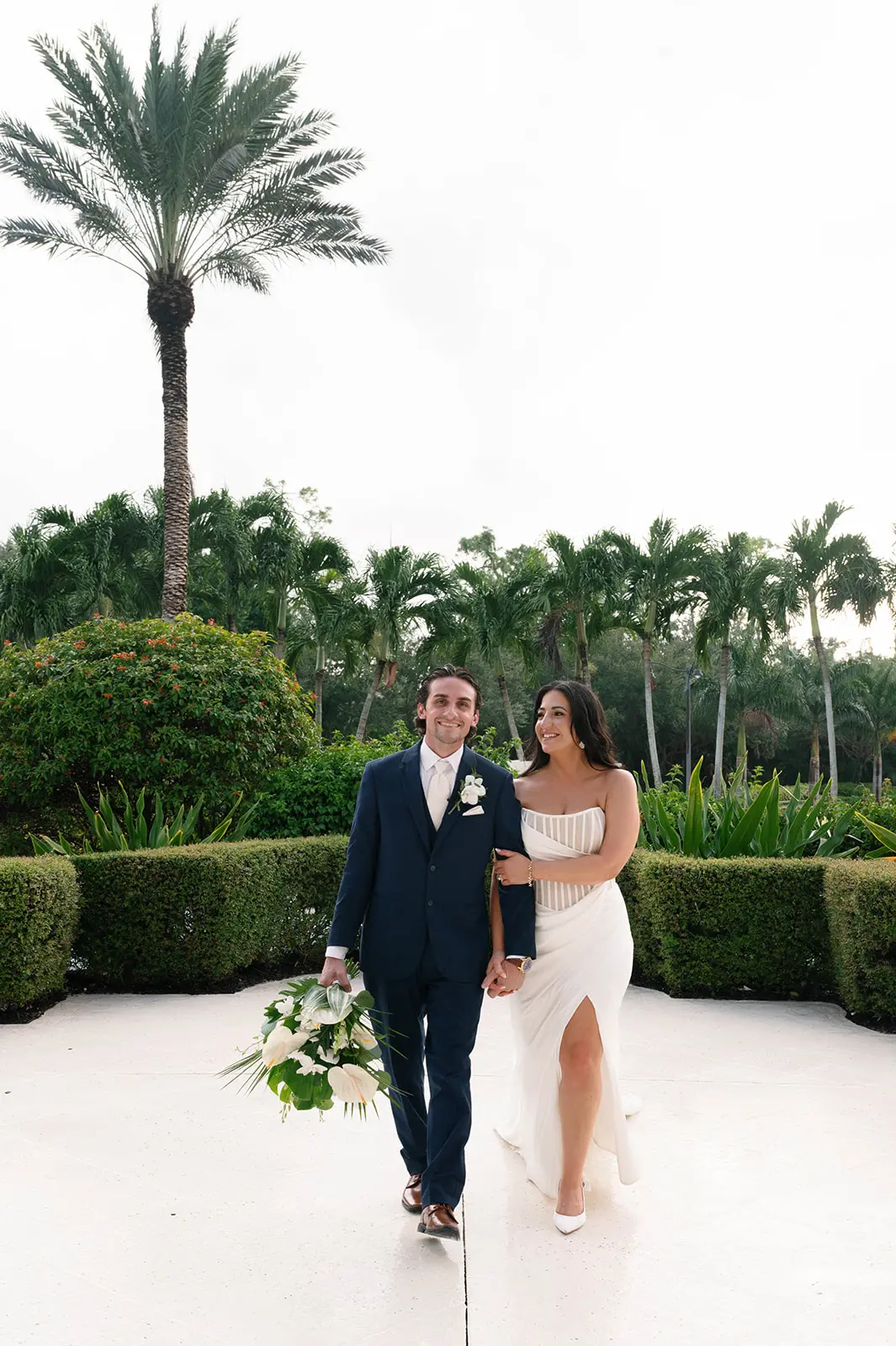 Bride Wearing Grecian Inspired Wedding Dress Called Gabrielle By Maggie Sottero With Groom