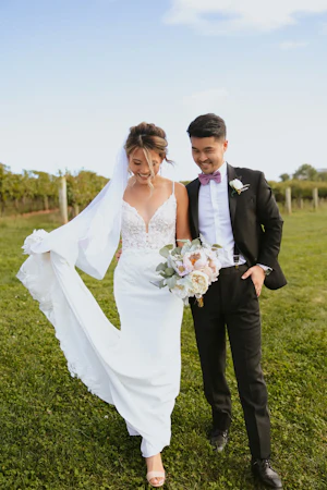 Bride In Lace Crepe Wedding Dress Called Alda By Rebecca Ingram With Groom