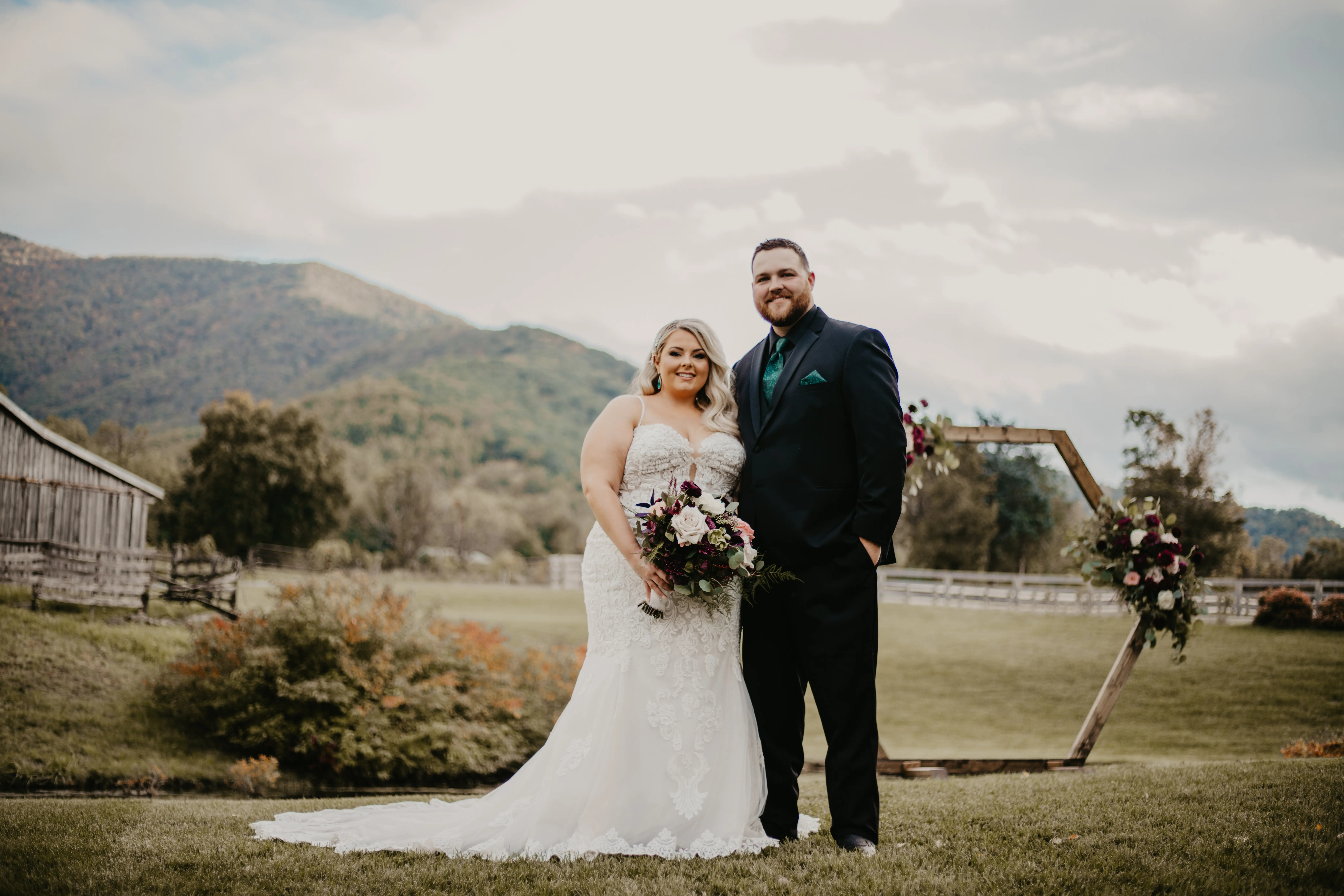 Bride wearing Fiona wedding gown by Maggie Sottero with her husband