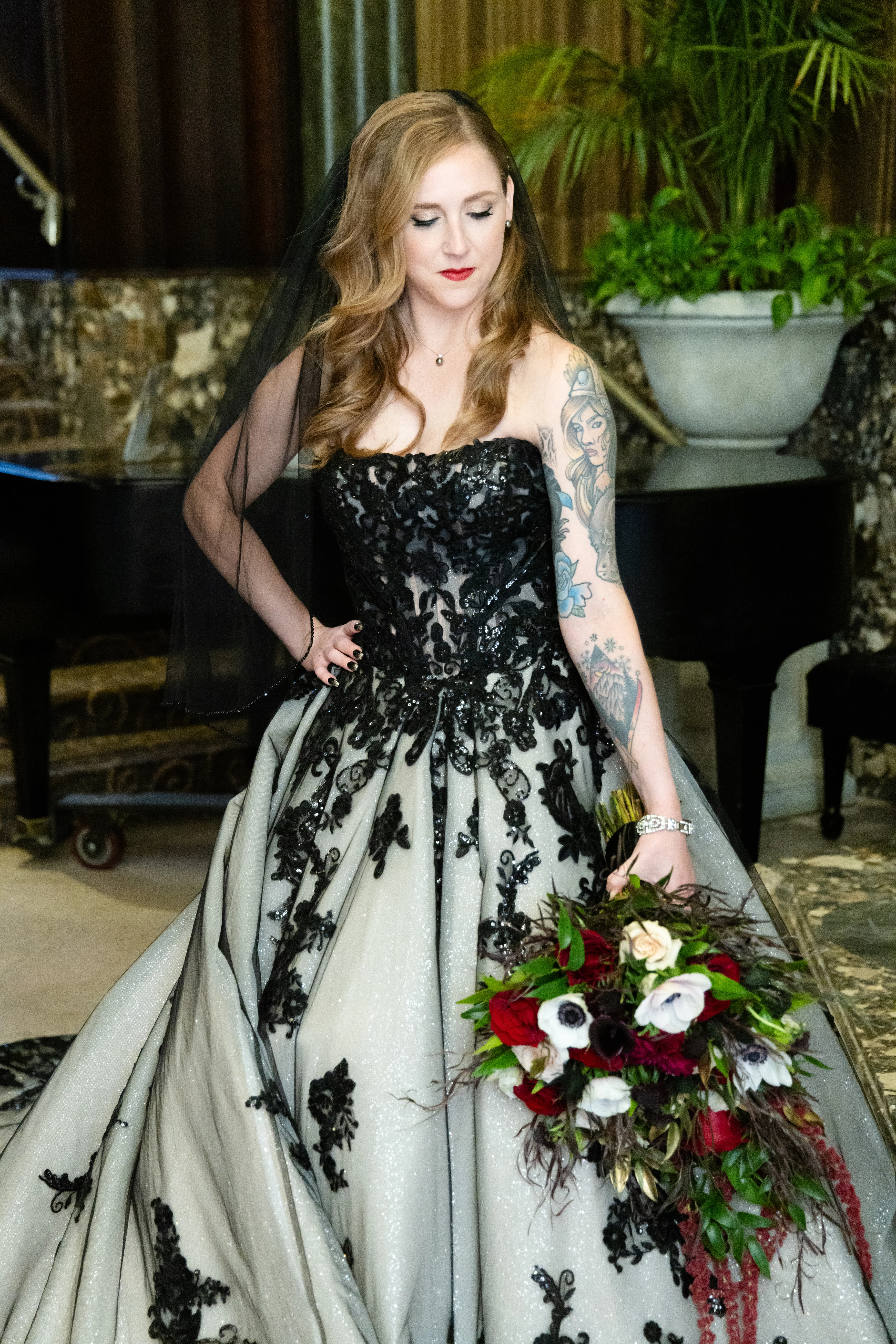 Bride wearing Norvinia wedding dress by Sottero and Midgley