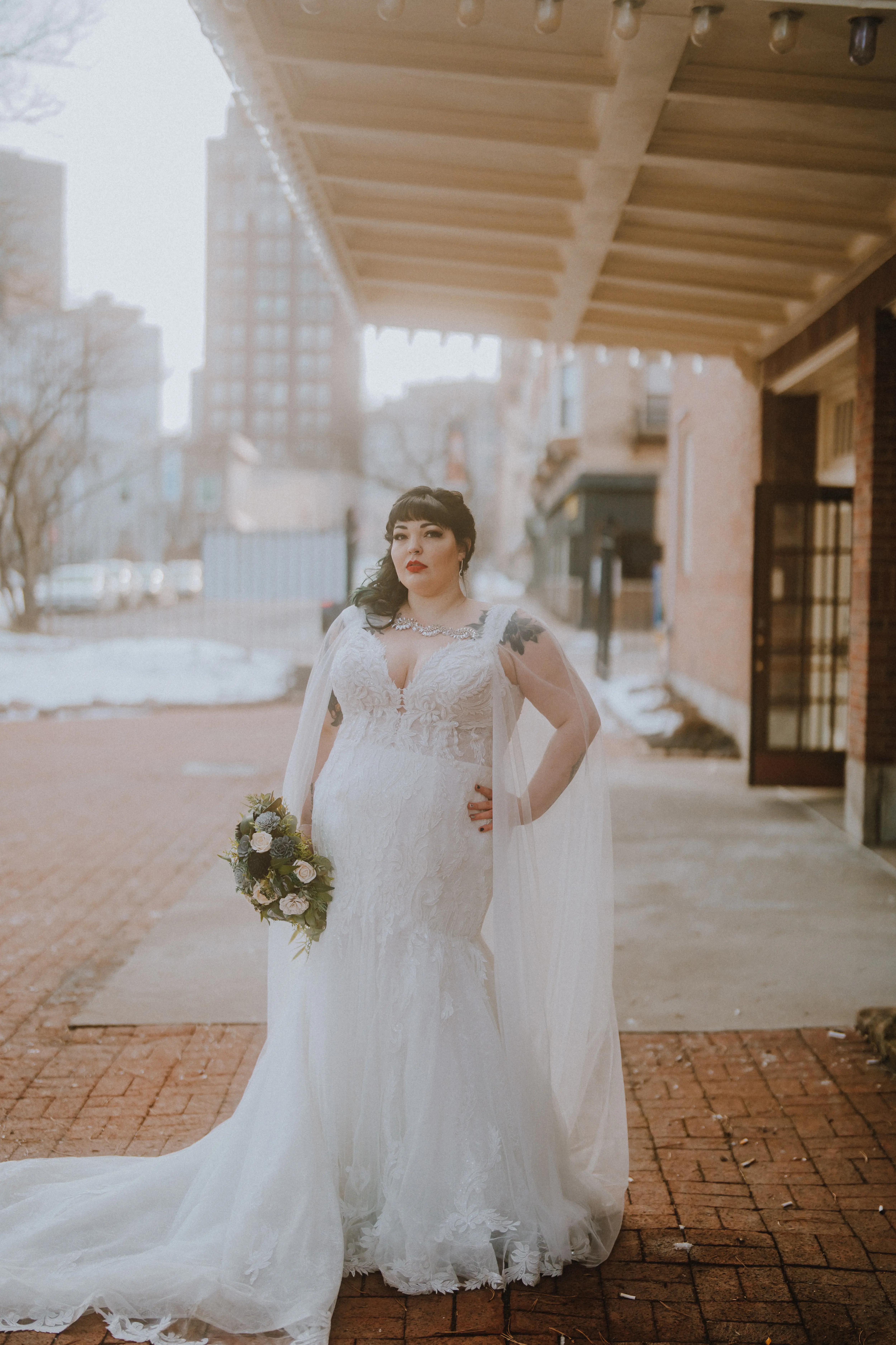 Real Bride in Cap-Sleeve Mermaid Wedding Dress with Lace Motifs and eep V-Neckline Called Joss by Sottero & Midgley
