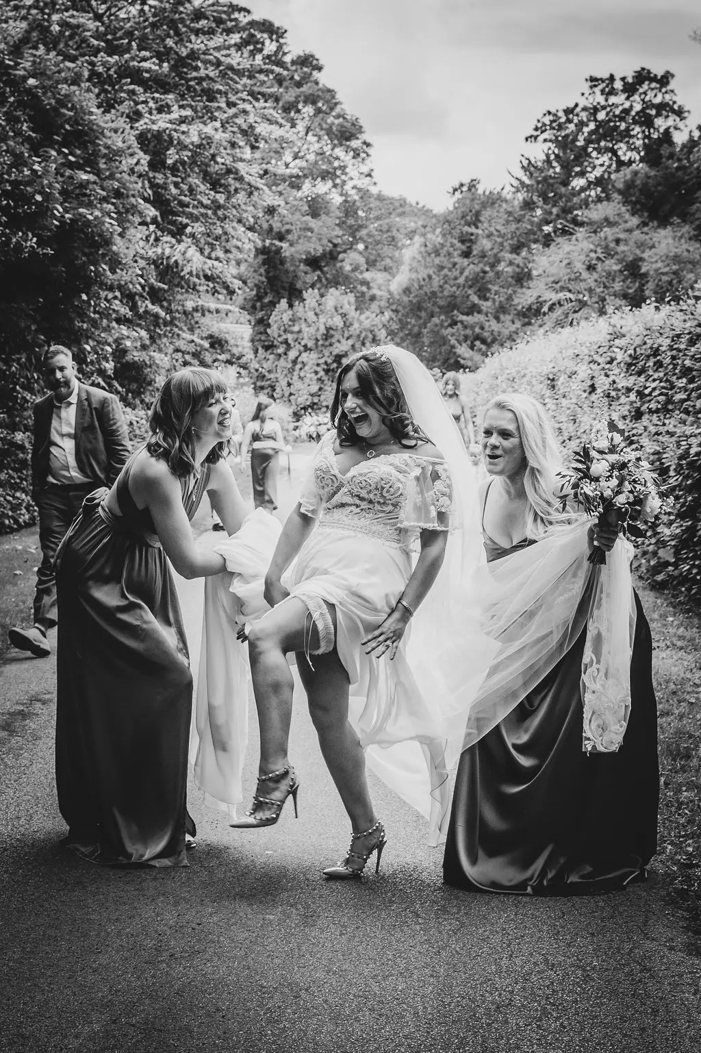 Bride wearing Lorraine by Rebecca Ingram with her friends