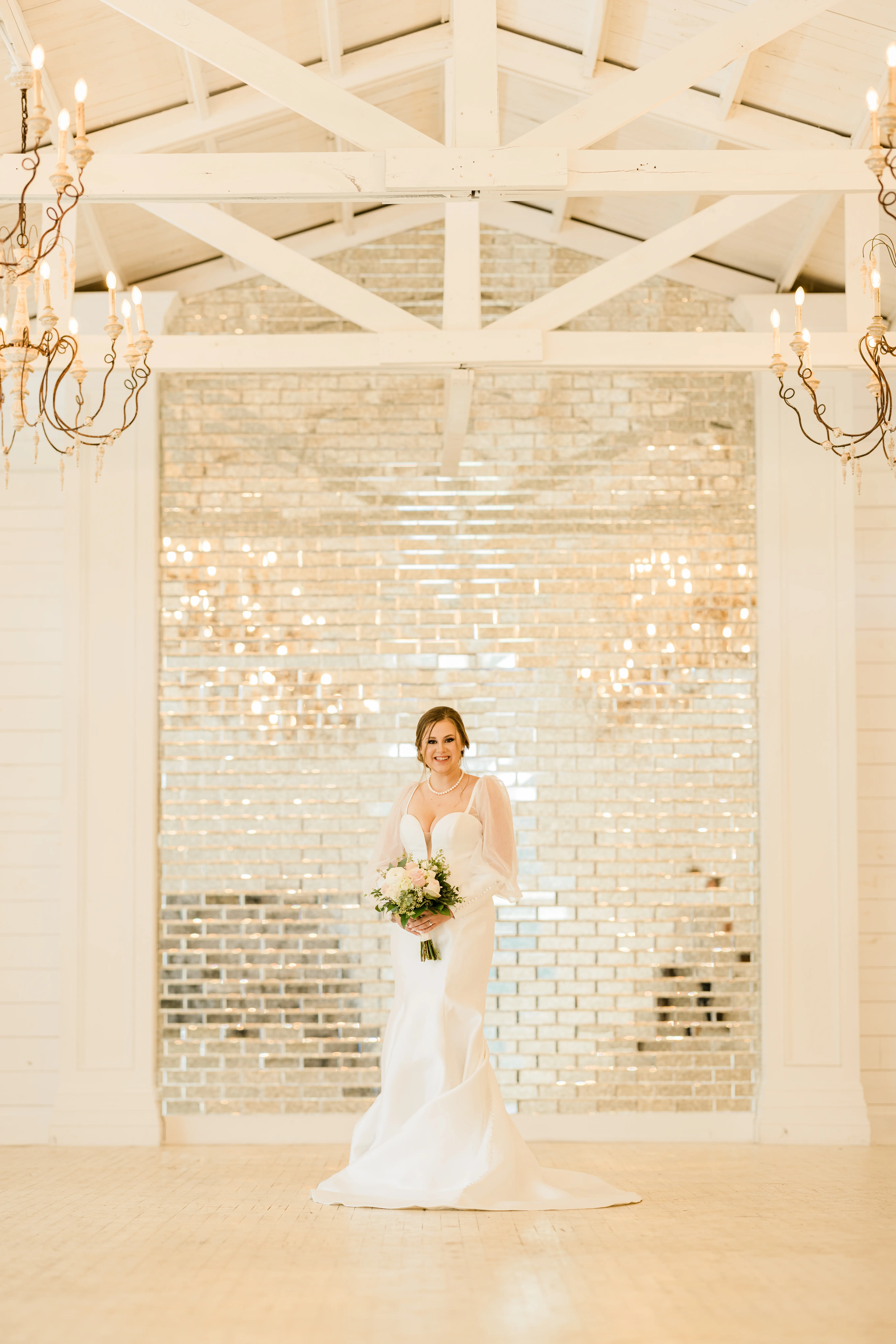 Bride Wearing Modern Mikado Mermaid Wedding Gown Called Pippa By Rebecca Ingram With Long Puff Sleeves