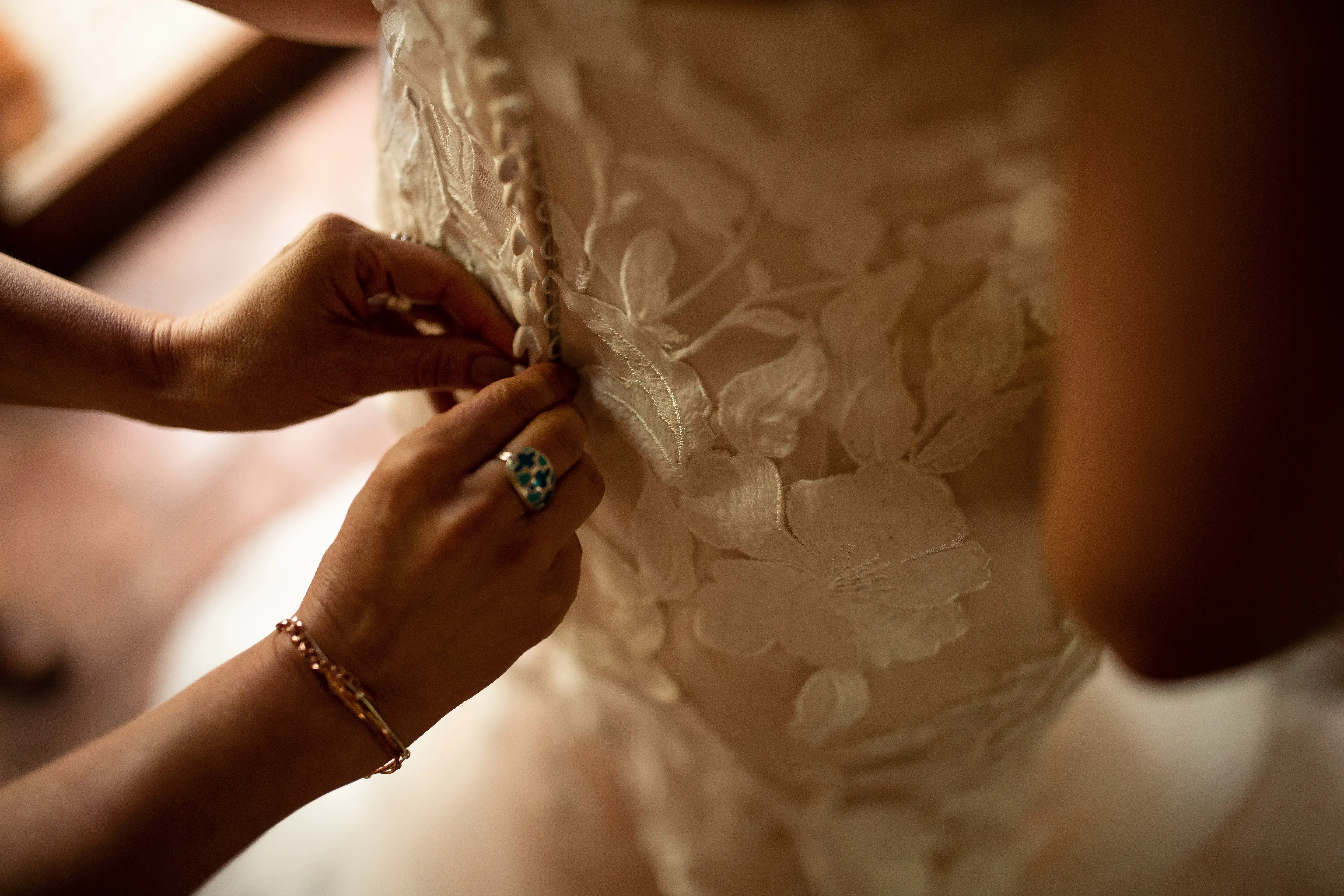 Bride wearing affordable, strapless mermaid wedding dress.