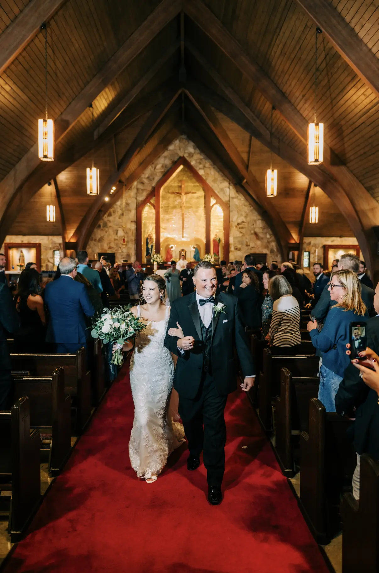 Bride Wearing Nature Lace Wedding Dress Called Albany By Maggie Sottero And Groom Walking Down The Aisle In A Chapel