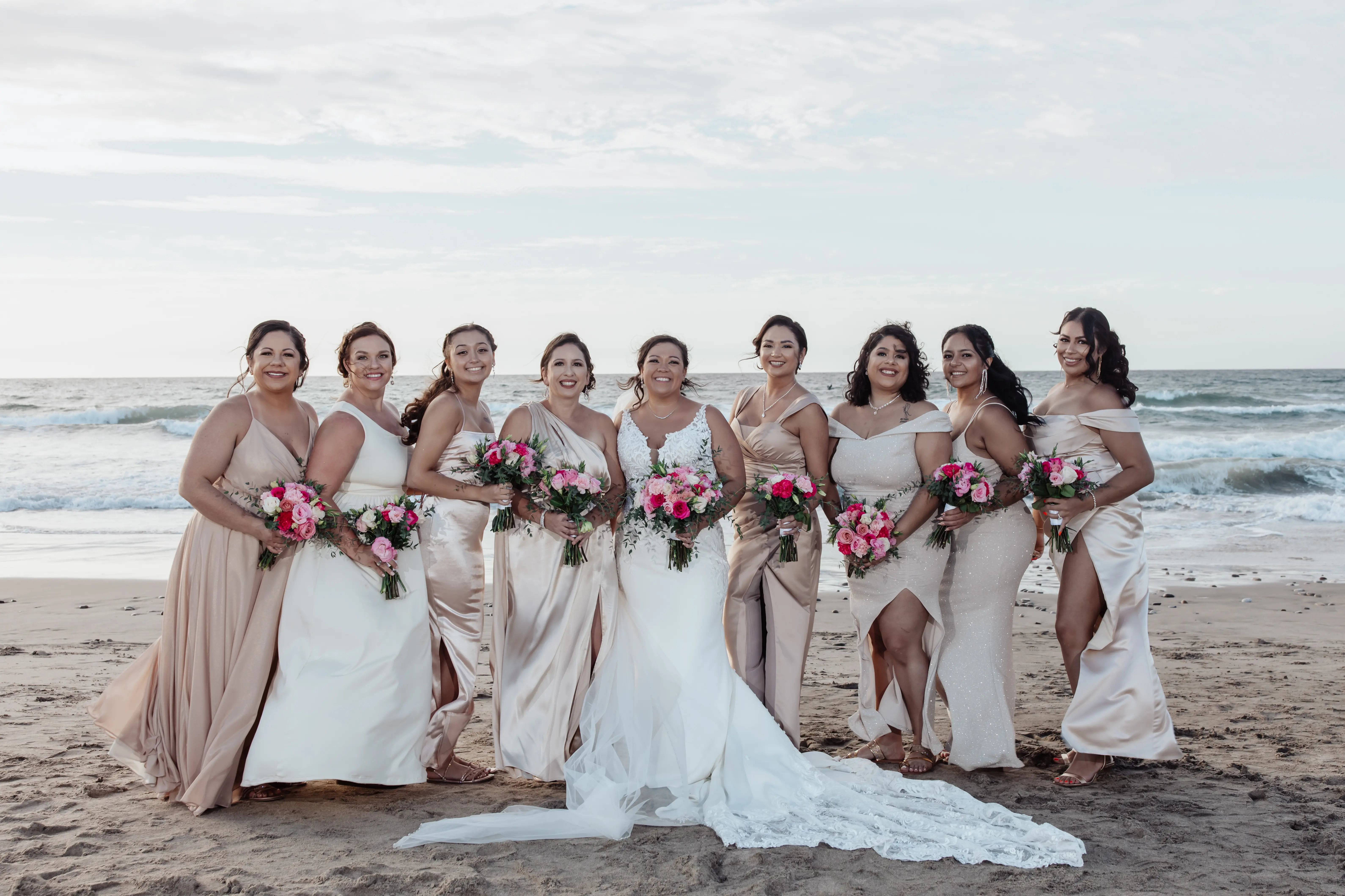 Bride wearing Johanna Lane by Maggie Sottero with her bridesmaids