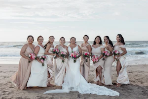 Bride wearing Johanna Lane by Maggie Sottero with her bridesmaids