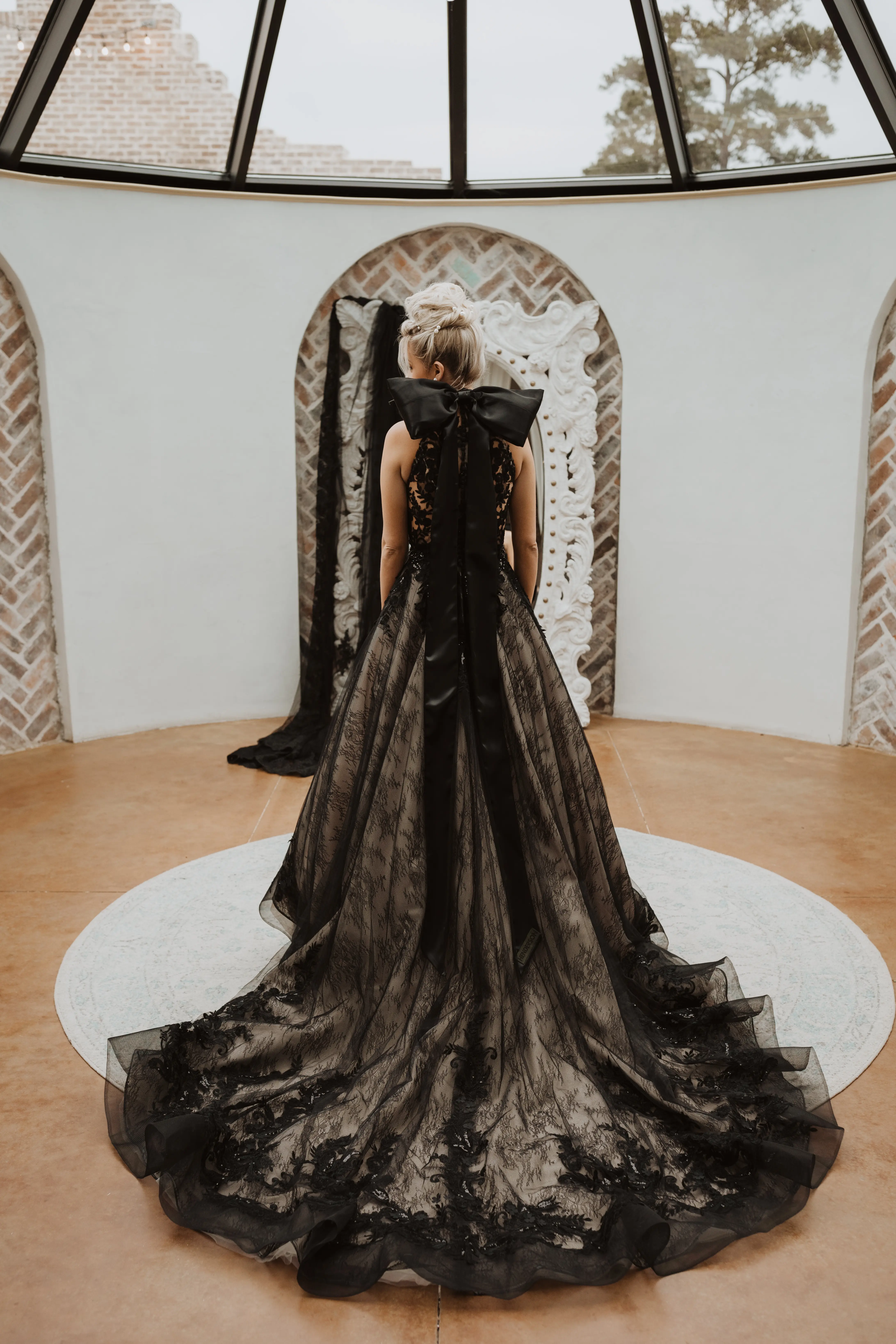 Real Bride in Beautiful Black Ball Gown Wedding Dress with Contrasting Layers of Tulle, Lace Motifs, and Chantilly Lace Called Zander by Sottero & Midgley