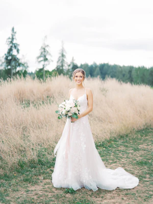 Bride wearing a budget friendly ballgown wedding dress