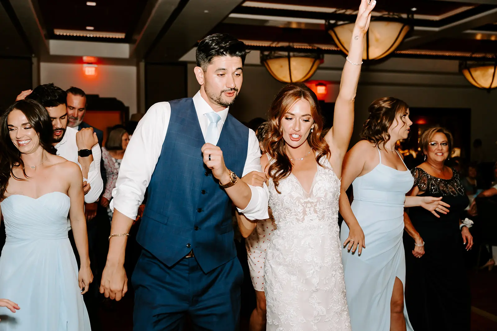 Groom With Bride Wearing Garden Inspired Lace Fit-And-Flare Greenley By Maggie Sottero