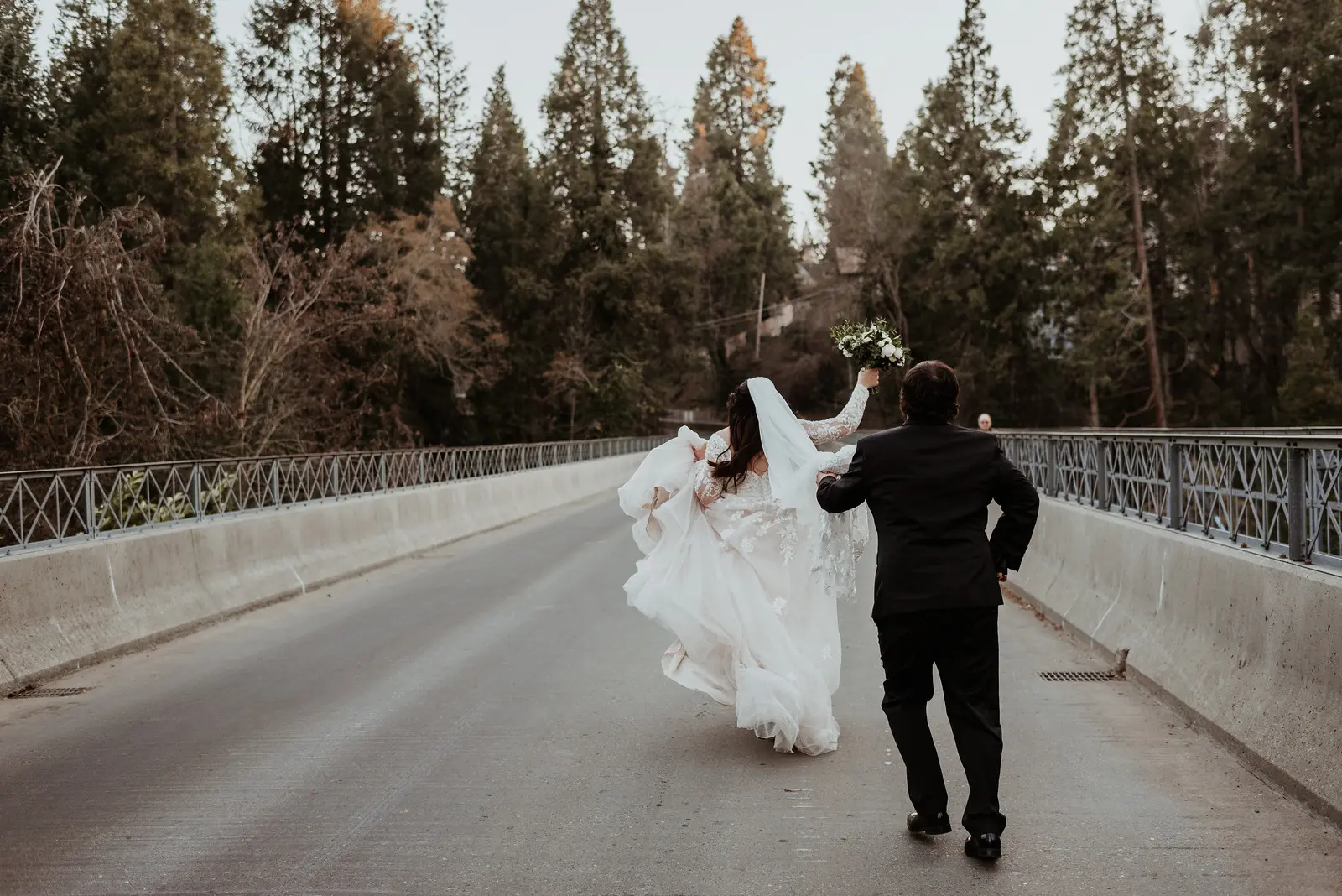 Real Bride wearing long sleeve A-Line wedding dress called Raphael by Maggie Sottero.