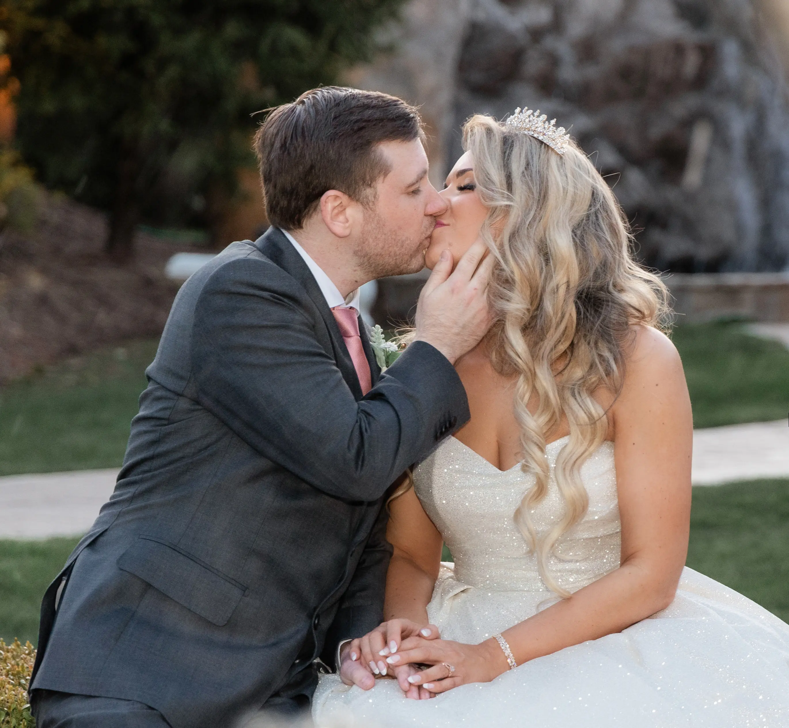 Bride wearing Anniston by Maggie Sottero kissing her husband