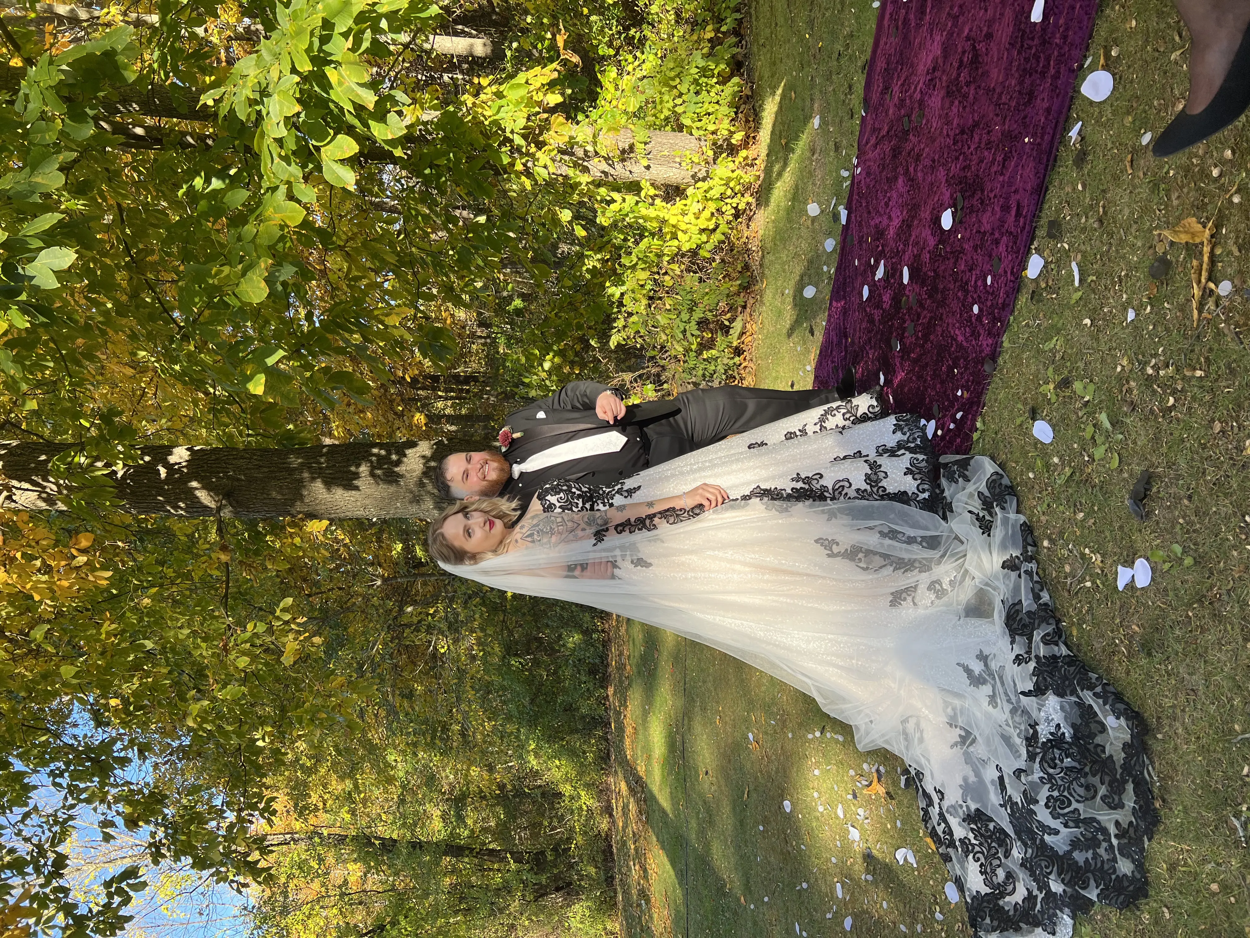 Bride Wearing Black Lace Wedding Dress Called Tristyn By Maggie Sottero With Groom