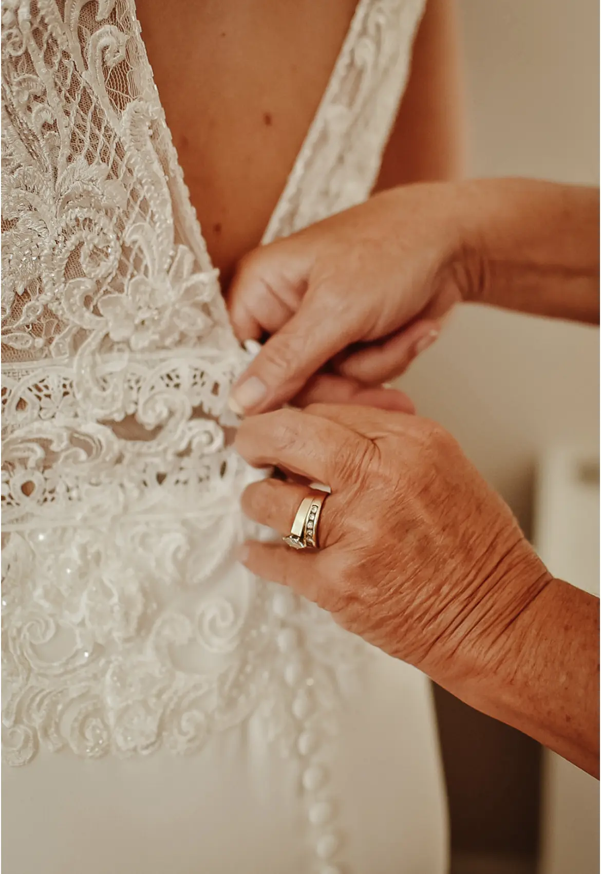 Bride Getting Ready Wearing Aidan Lace Sheath Bridal Dress Called Aidan By Maggie Sottero