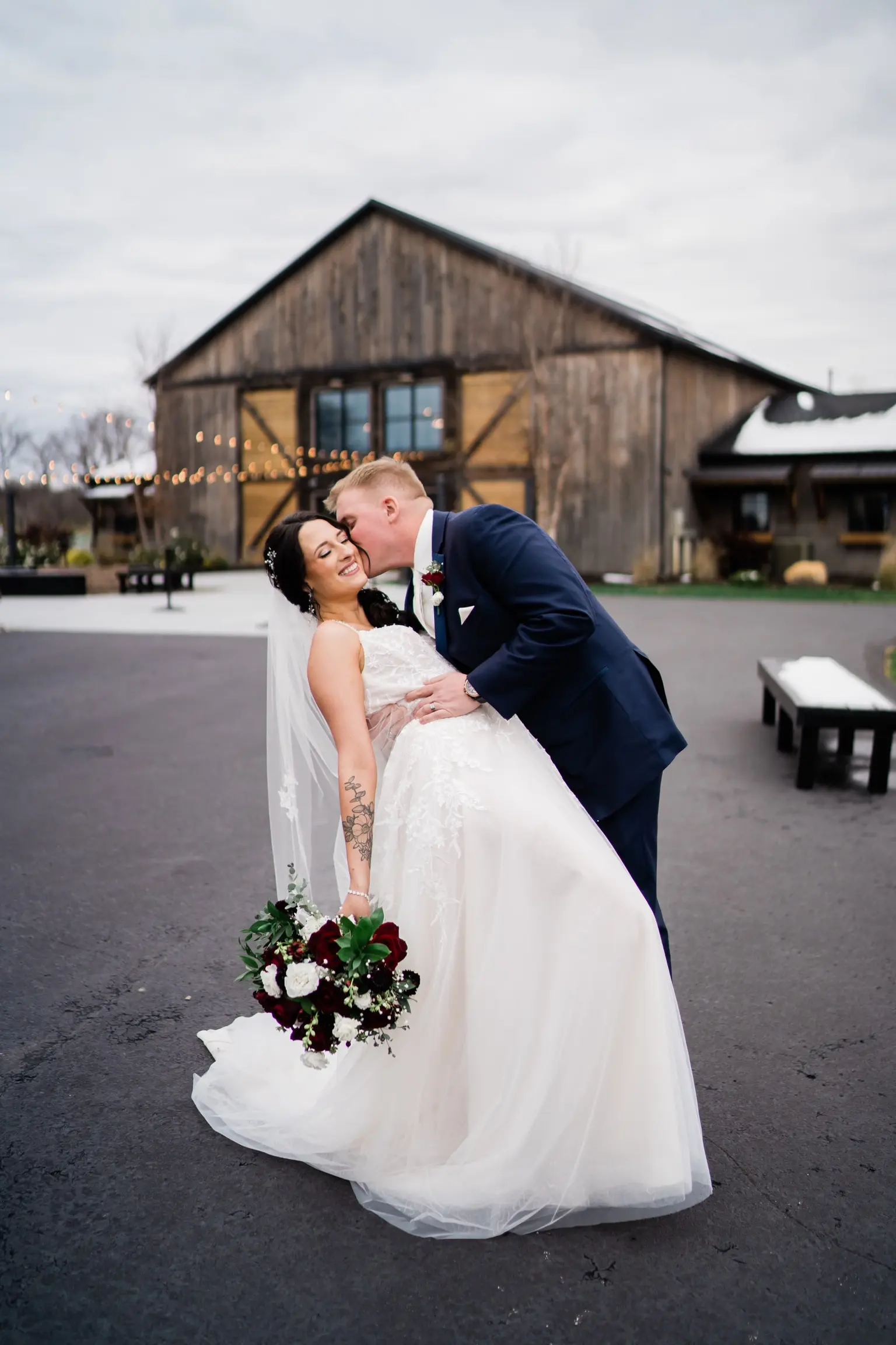 Bride Wearing Ballerina-inspired Romantic Wedding Dress Called Fairbanks By Maggie Sottero Getting Dipped By Groom