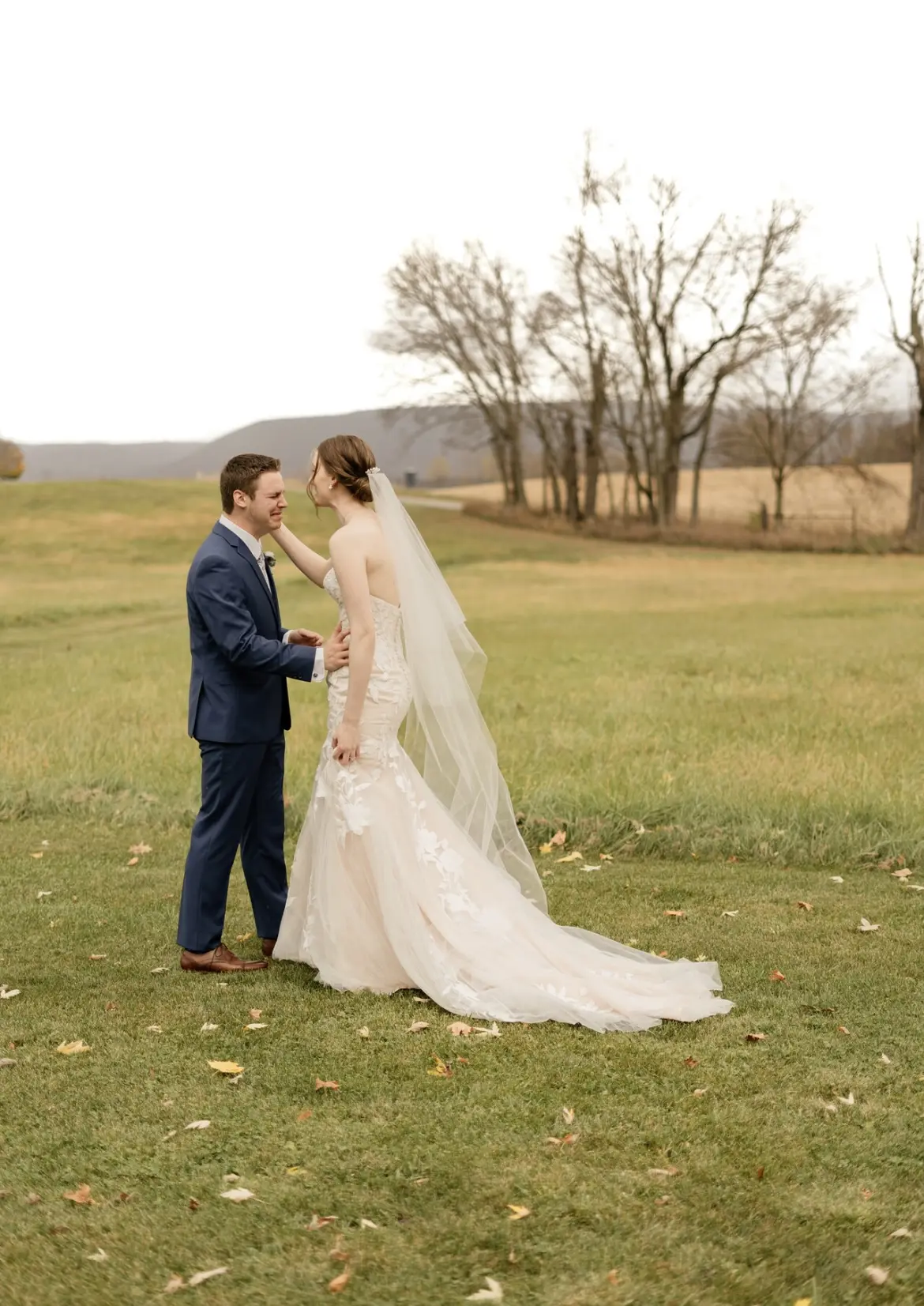Beautiful Moment Of Bride And Groom First Look. Bride Wearing Mermaid Wedding Dress With Oversized Lace Called Hattie By Rebecca Ingram