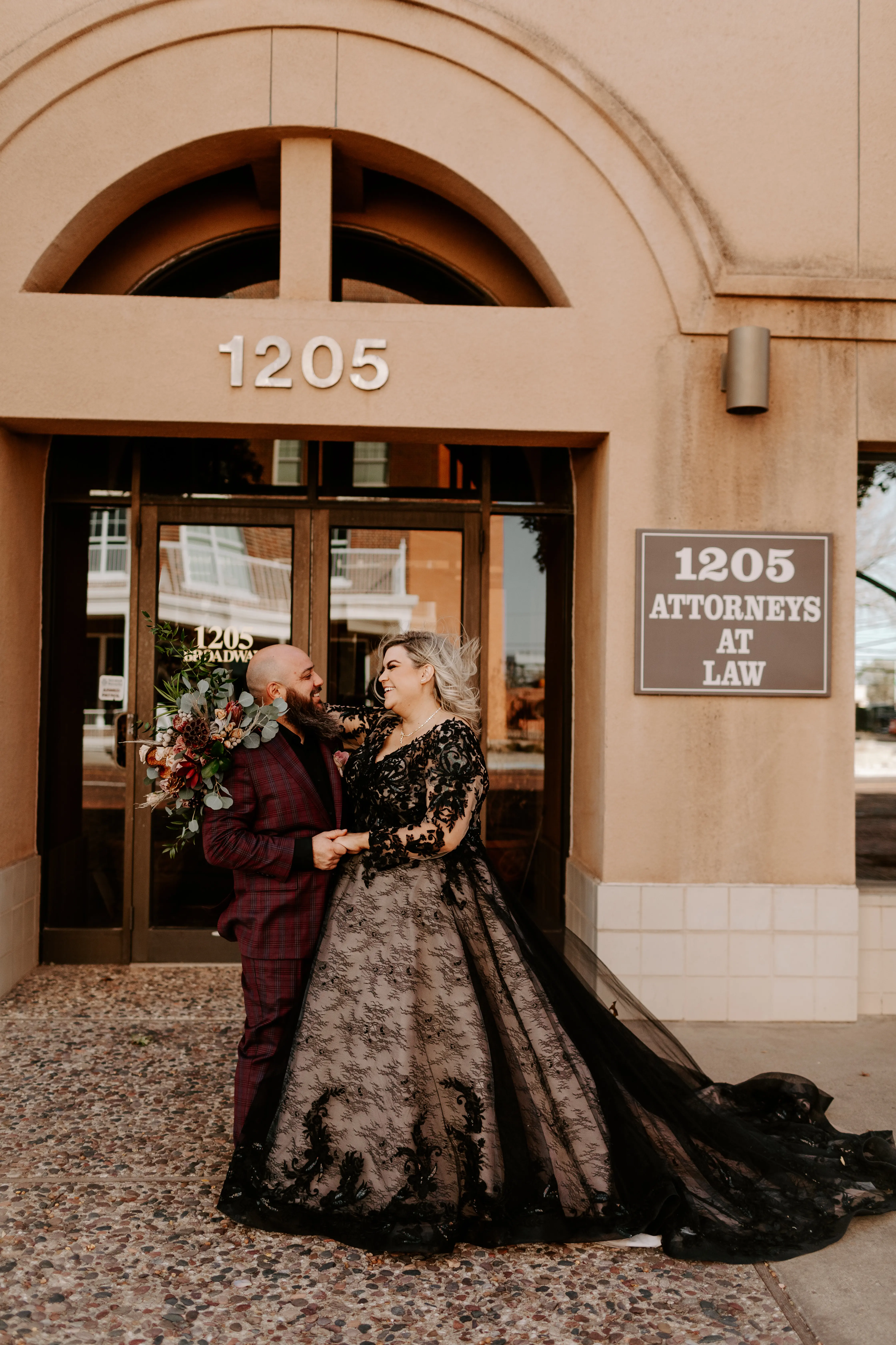 Bride Wearing Black Lace Wedding Dress Called Zander By Sottero And Midgley Looking At Groom