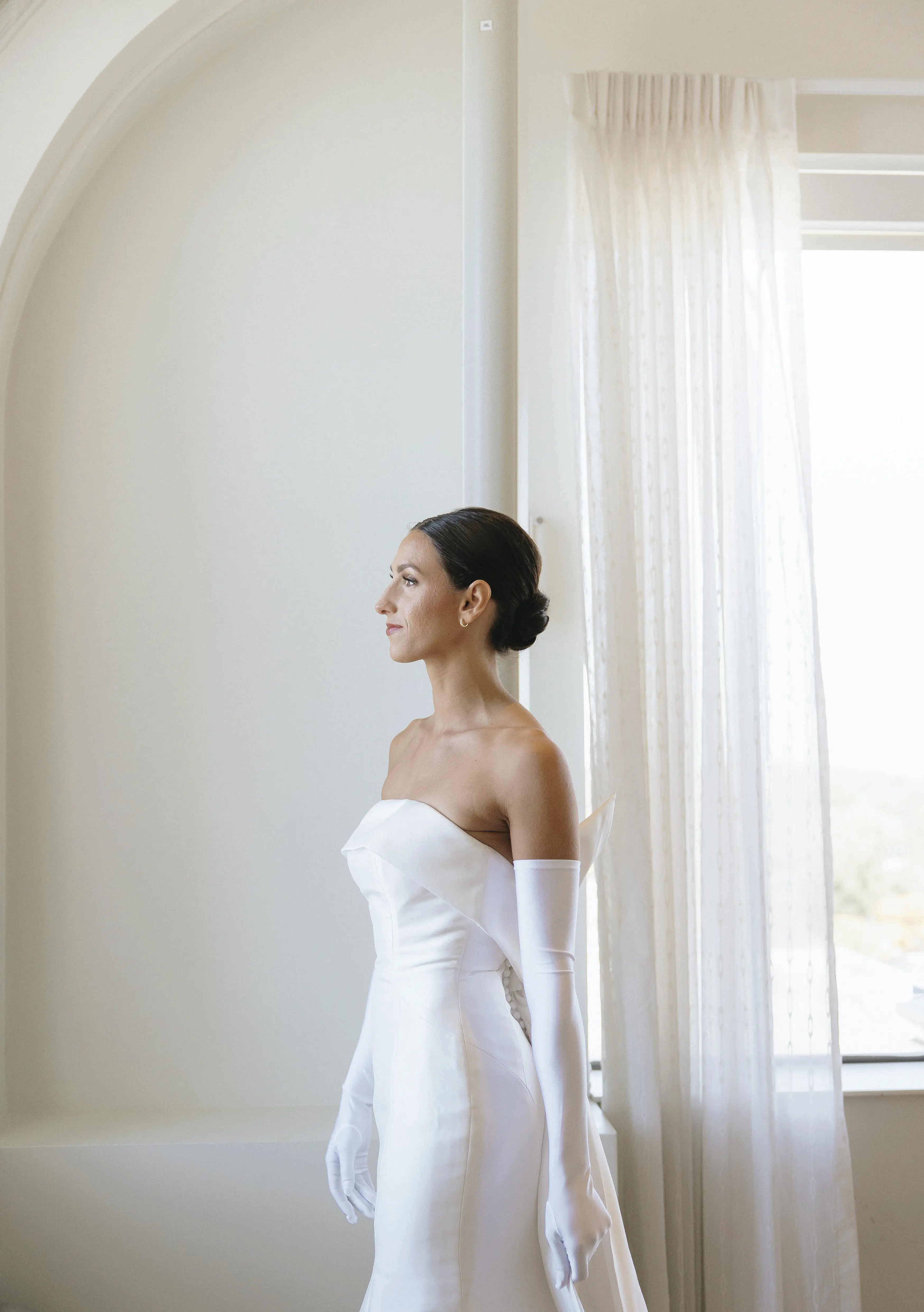 Bride wearing Mitchell wedding dress by Maggie Sottero