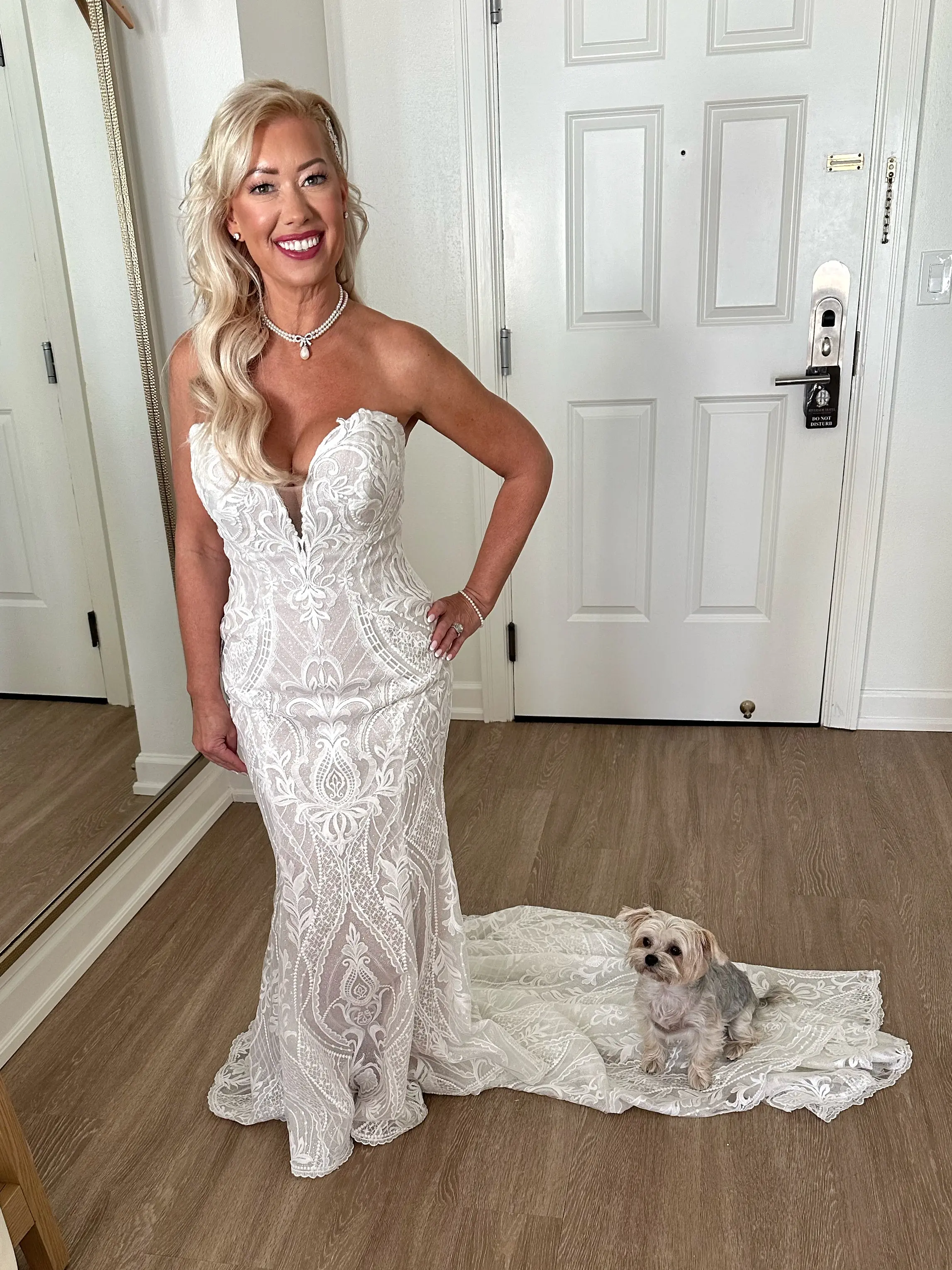 Bride Wearing Lace Mermaid Wedding Dress Called Bronson By Sottero And Midgley With Dog Sitting On Her Train