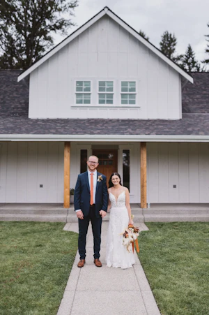 Bride Wearing Lace A-Line Wedding Dress Called Tuscany Lane By Maggie Sottero With Groom