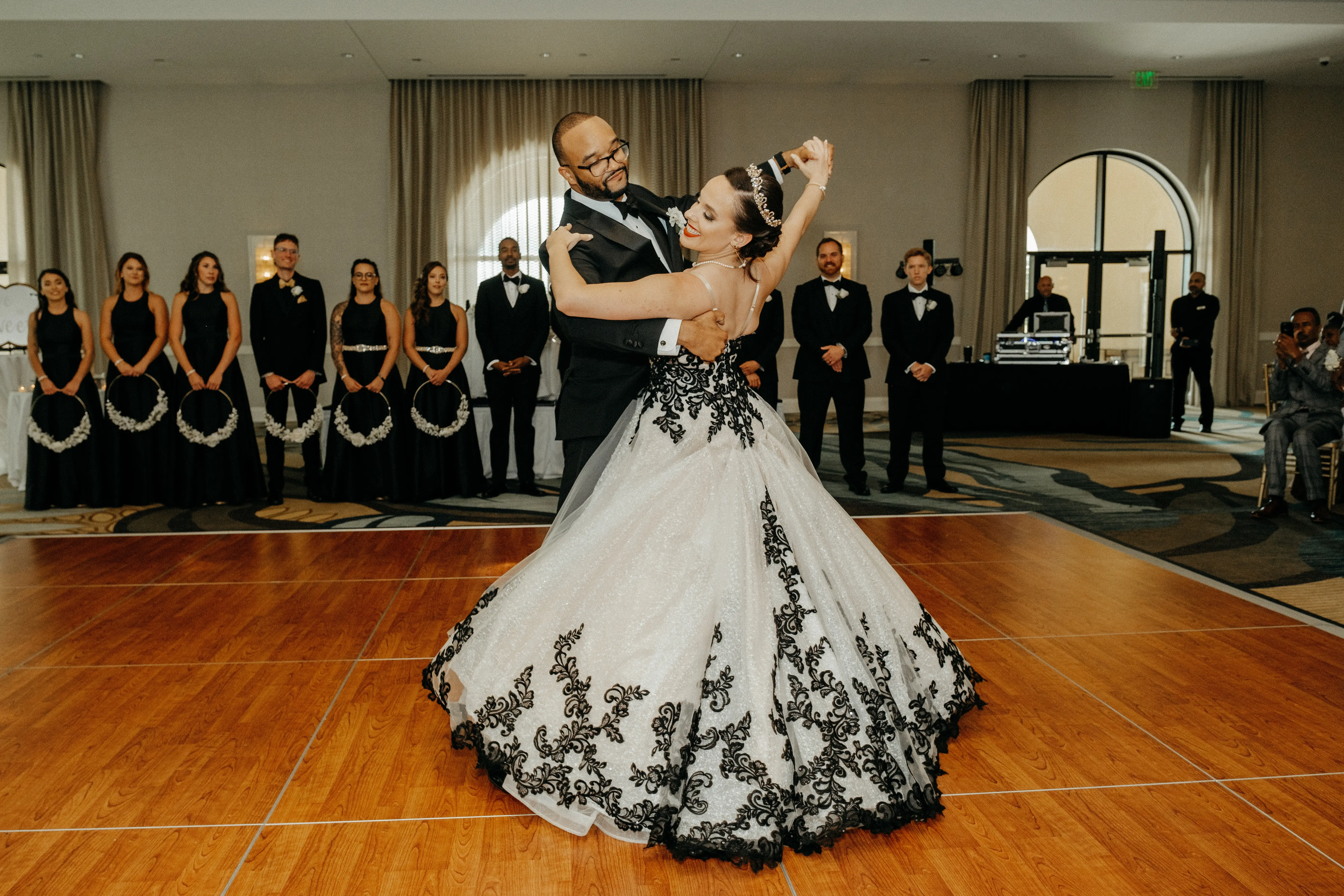 Bride wearing Tristyn wedding dress by Maggie Sottero dancing with her husband