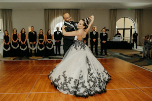 Bride wearing Tristyn wedding dress by Maggie Sottero dancing with her husband