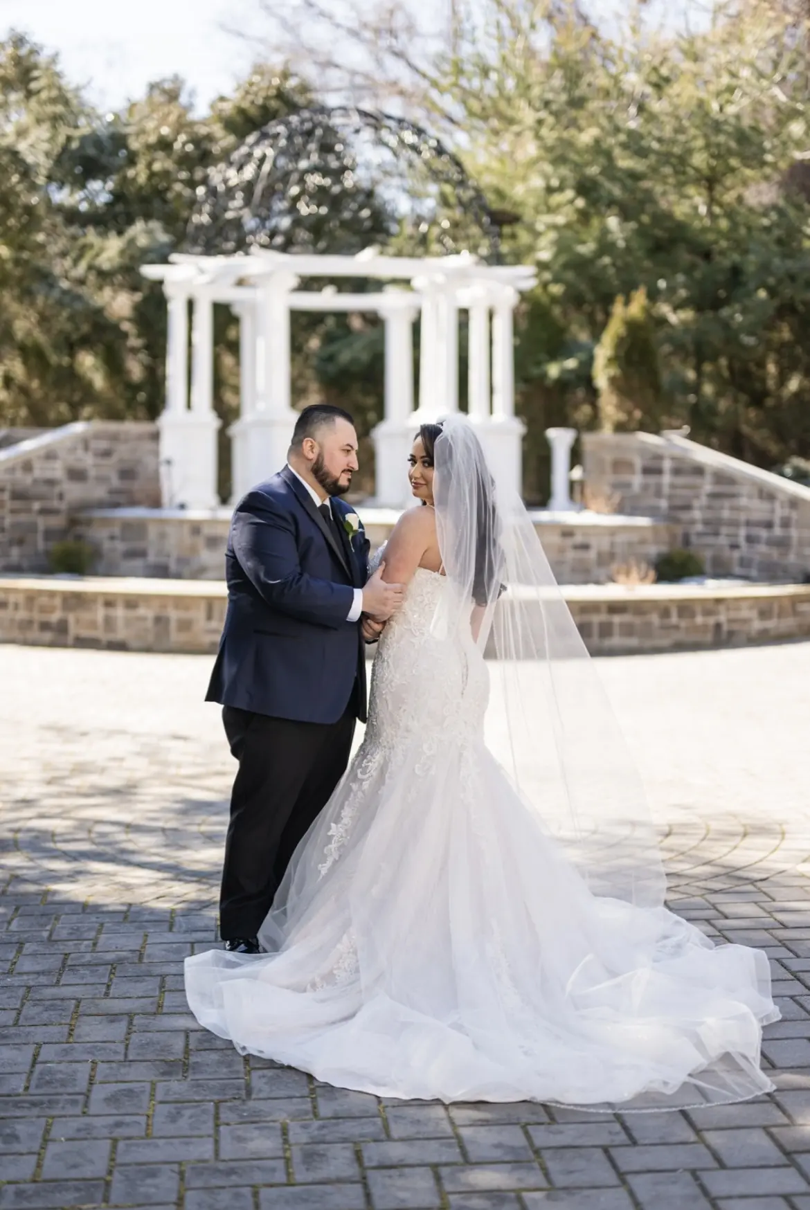 Groom Posing With Bride In Glamorous Glitter Tulle and Lace Mermaid Wedding Dress Called Lonnie Lynette By Maggie Sottero
