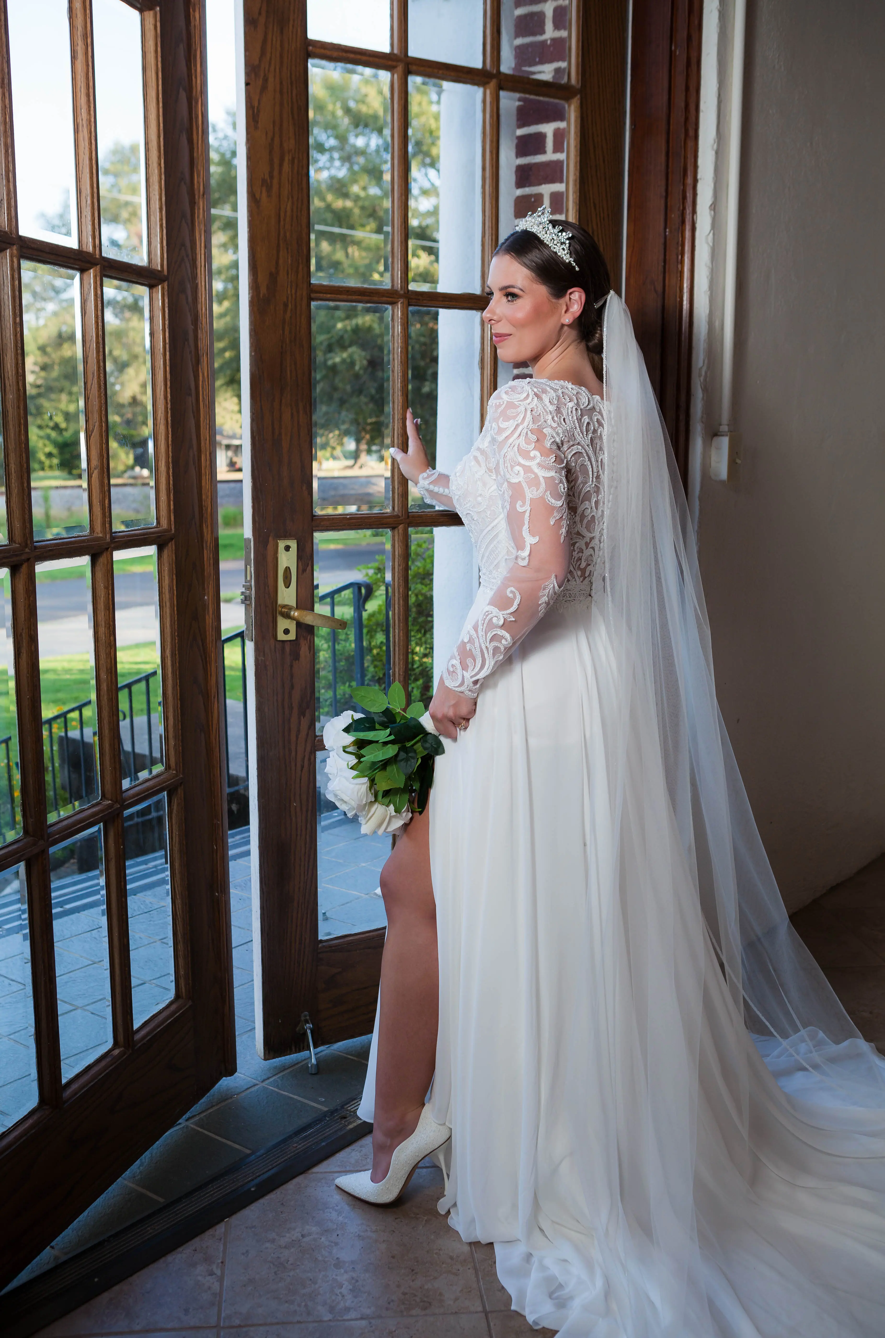 Bride wearing Lorraine Dawn wedding dress by Rebecca Ingram