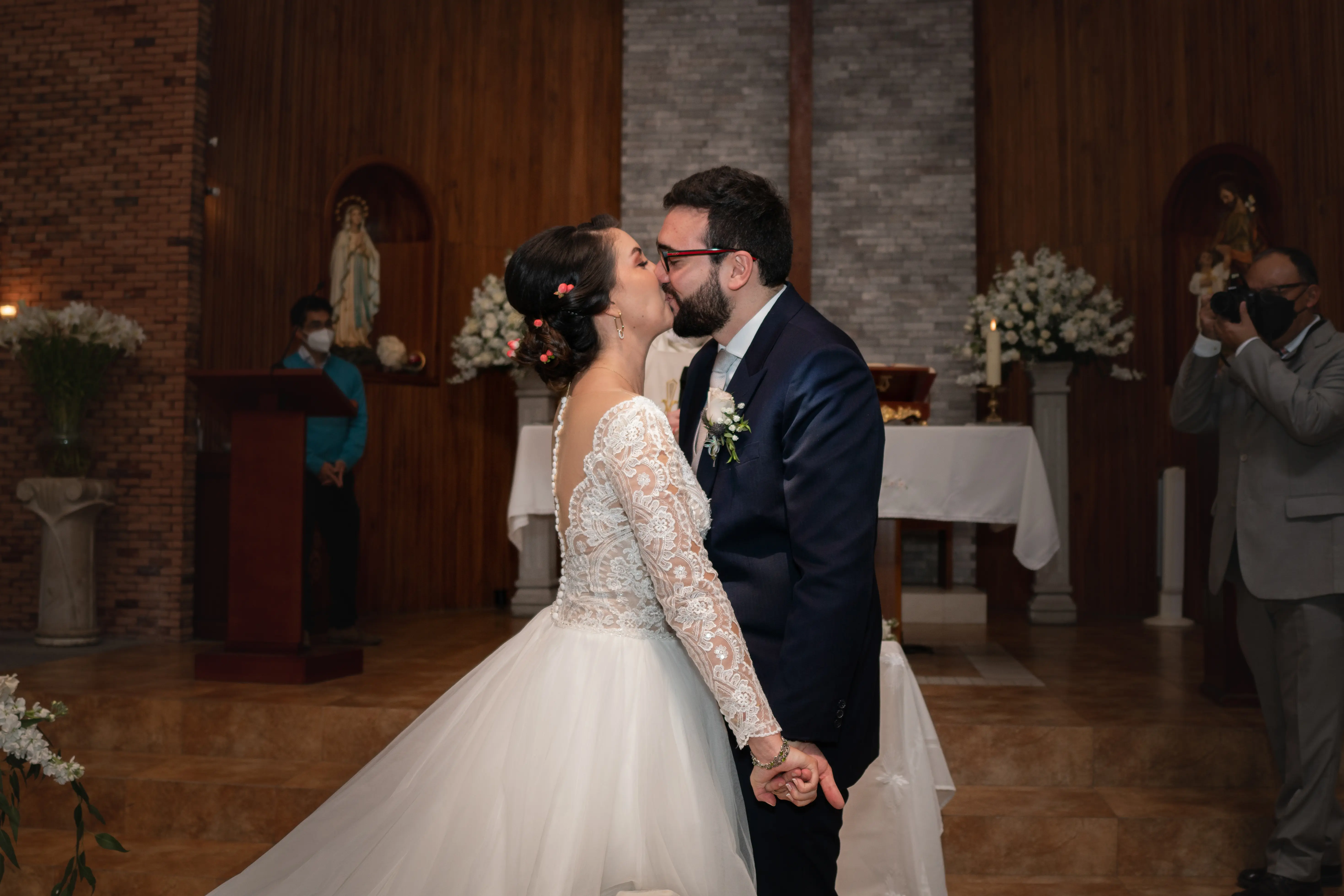 Bride in Long Sleeve Ball Gown Wedding Dress Named Mallory Dawn by Maggie Sottero with Groom