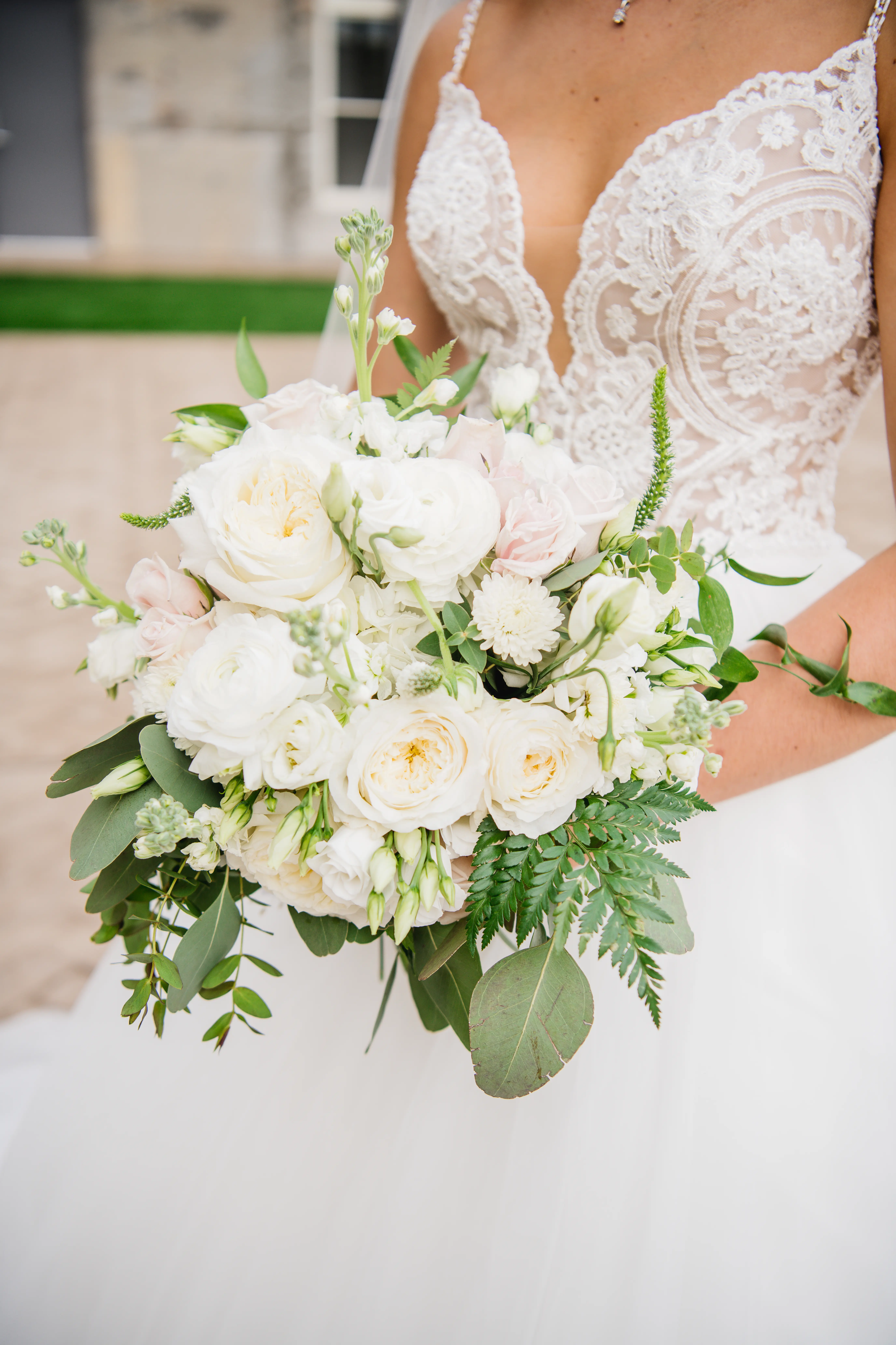 Bride wearing a boho princess wedding dress in lace and tulle