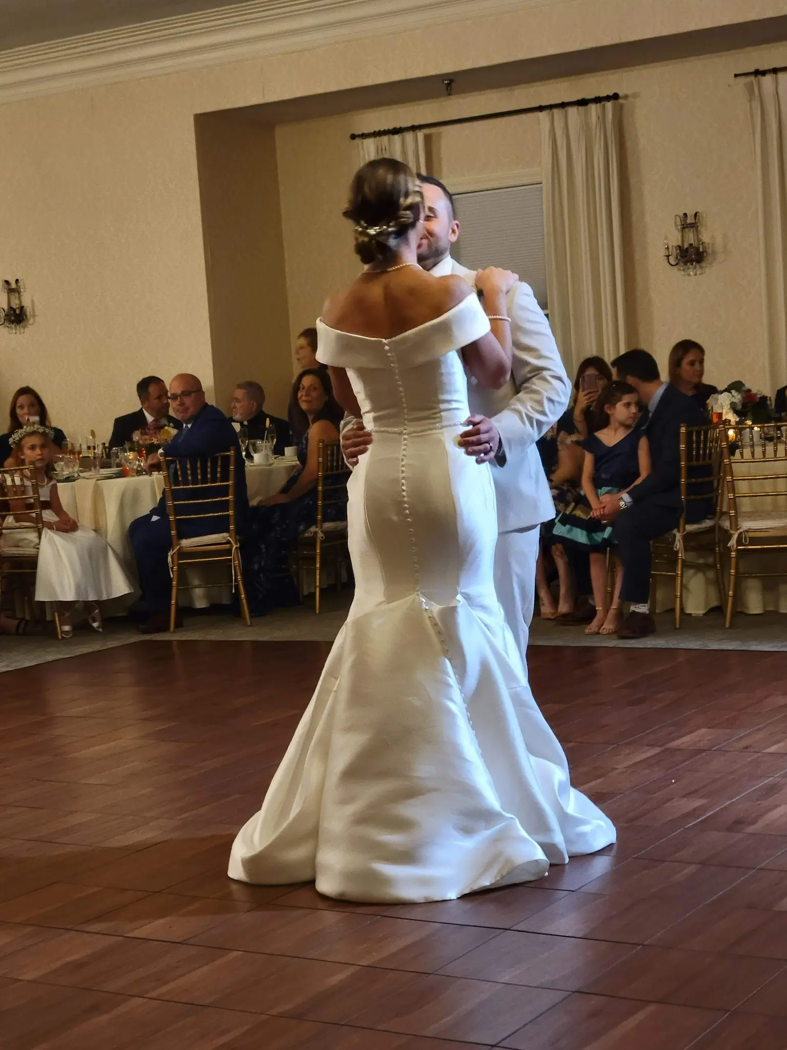 Bride Wearing Simple Fit And Flare Wedding Dress Called Josie By Rebecca Ingram Dancing With Groom