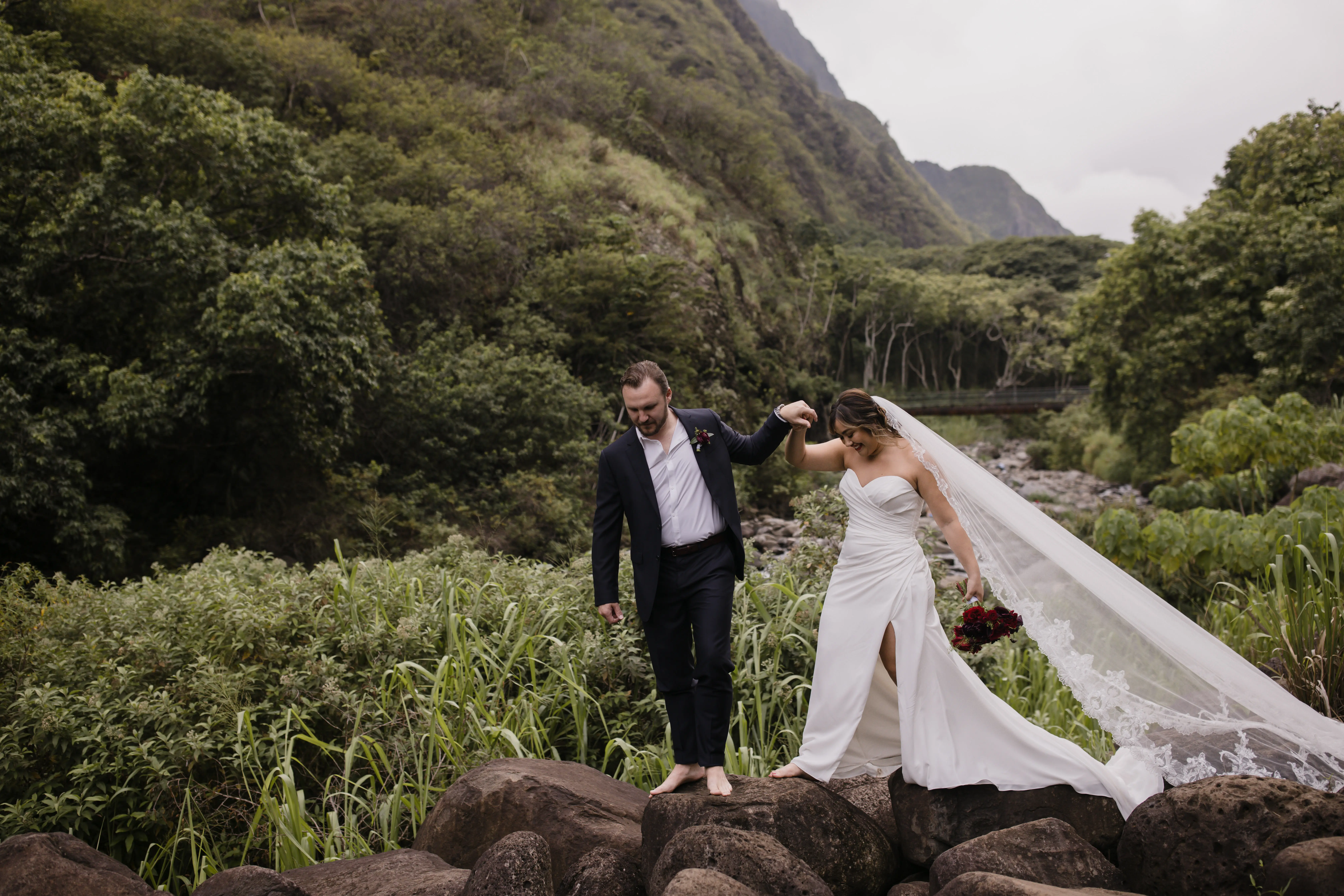 Bride On Beach With Groom In Strapless Wedding Dress Called Monaco By Maggie Sottero