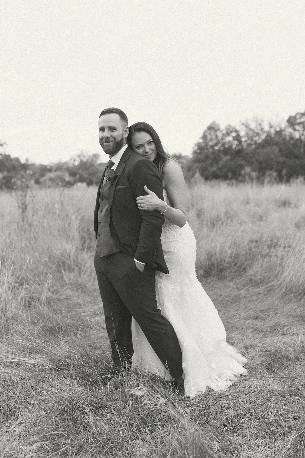 Groom With Bride Wearing Floral Beaded Mermaid Gown Lennon By Maggie Sottero