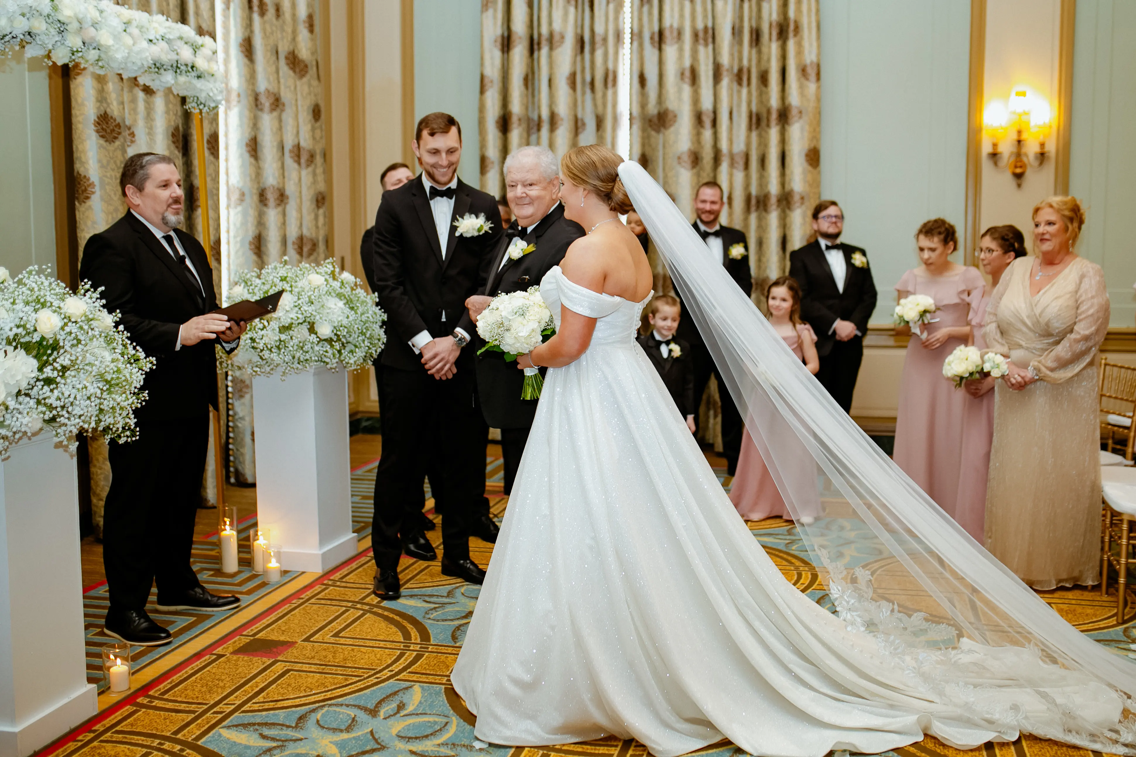 Bride wearing Anniston by Maggie Sottero being given away by her father