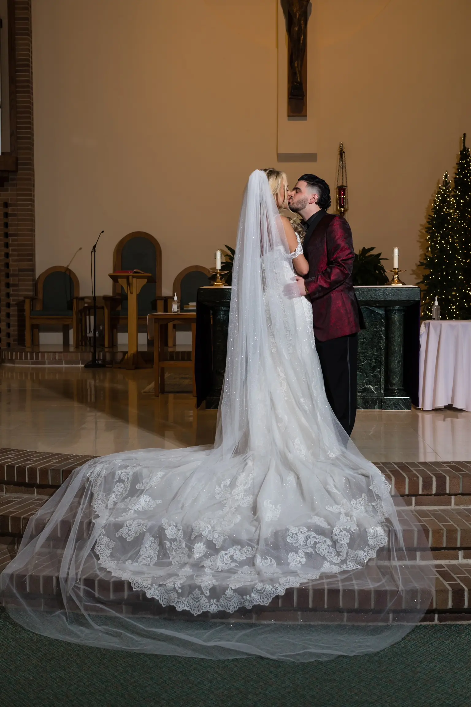 Bride In Lace Off The Shoulder Wedding Dresses Called Fiona By Maggie Sottero With Groom