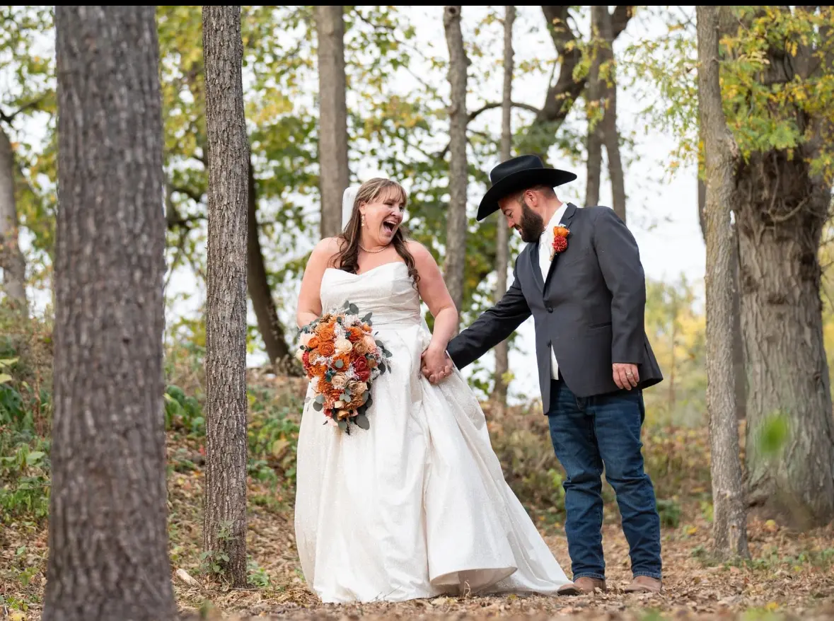 Bride Wearing Sparkly Aline Wedding Dress Called Anniston By Maggie Sottero Holding Hands With Groom