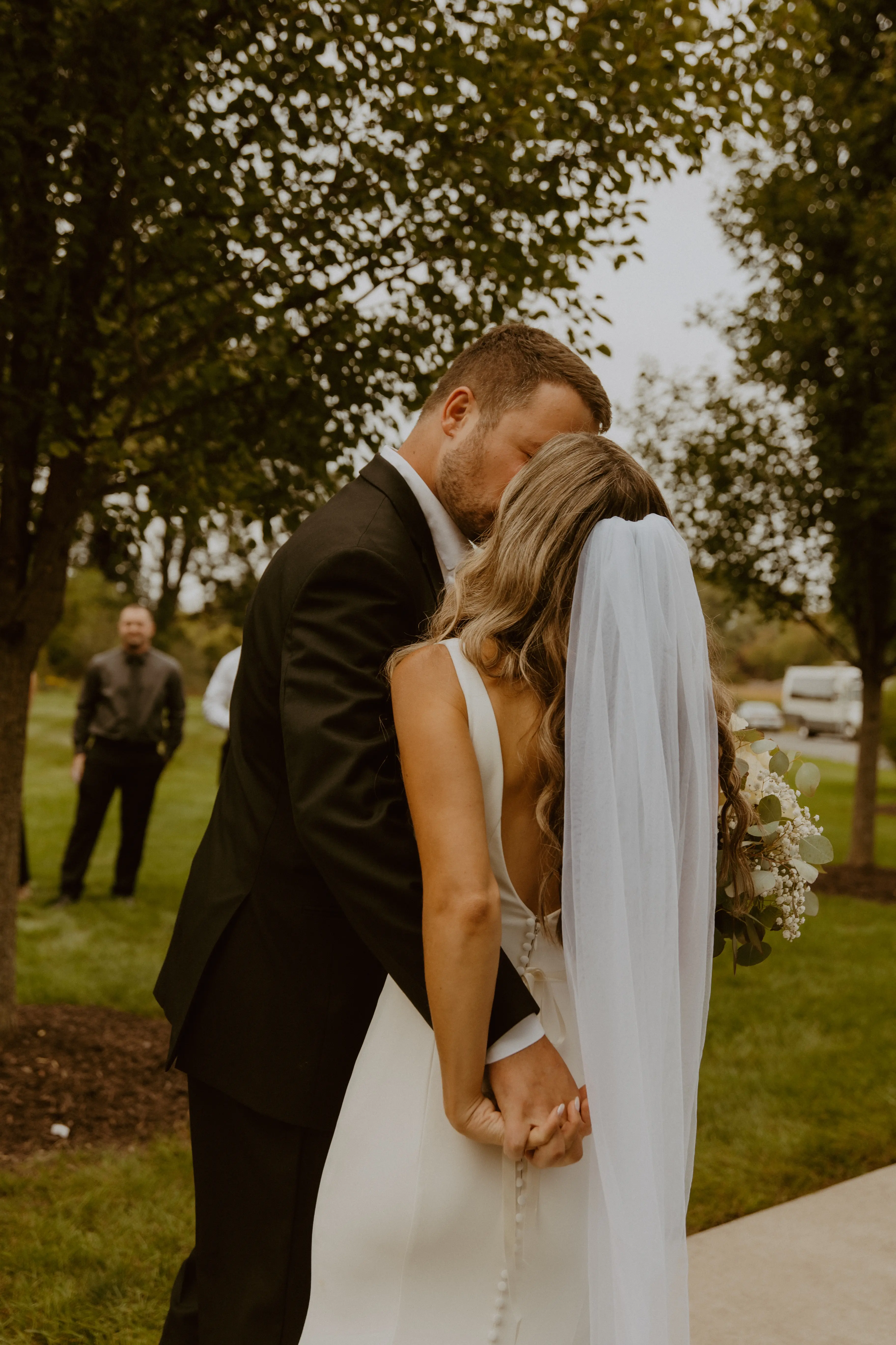 Bride Wearing Simple Fit-and-Flare Wedding Dress Called Fernanda By Maggie Sottero With Groom