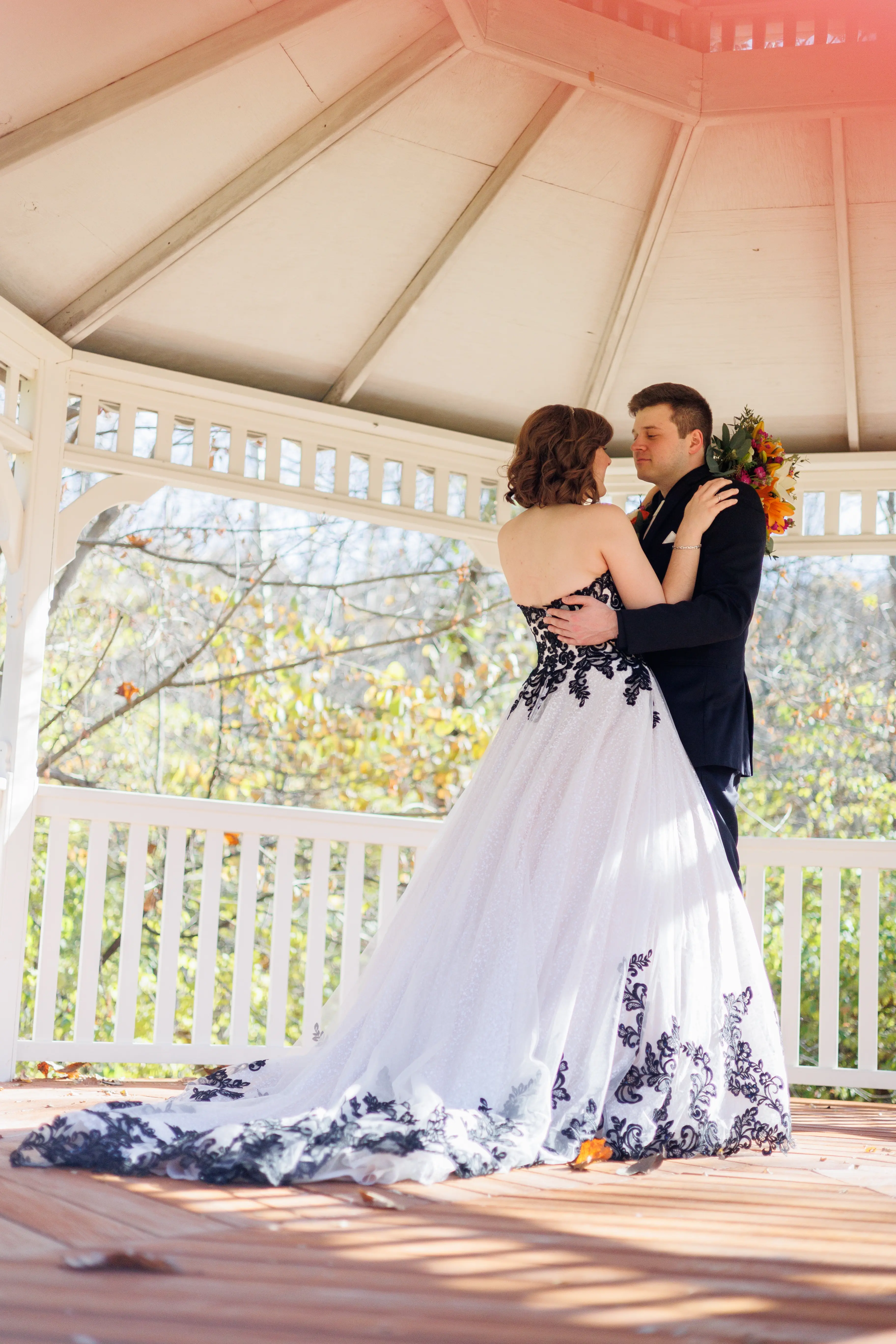 Bride Wearing Black And White Lace Strapless Ball Gown Called Tristyn By Maggie Sottero
