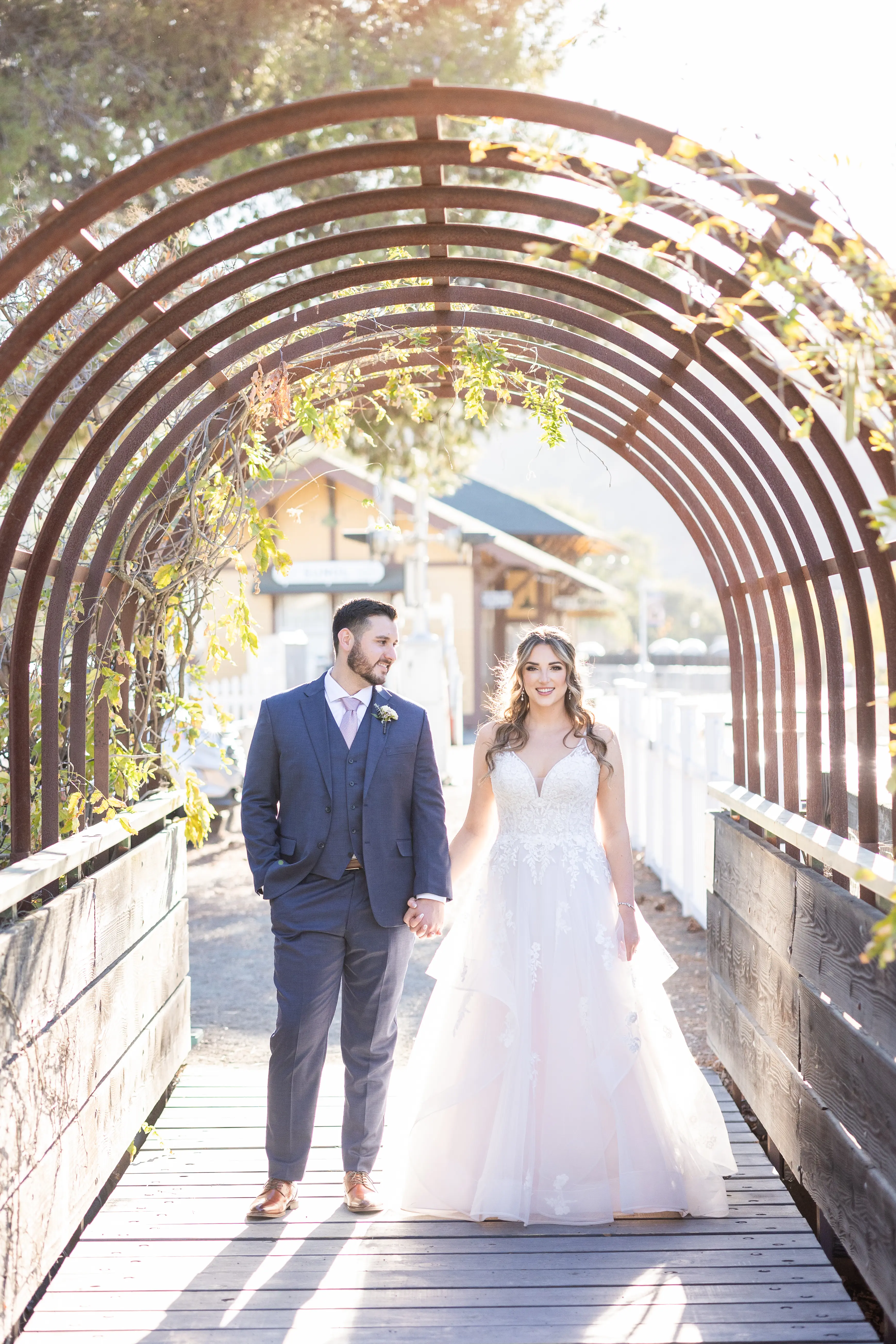 Groom With Bride Wearing Lace Wedding Dress With Tiered Tulle Skirt Lettie By Rebecca Ingram